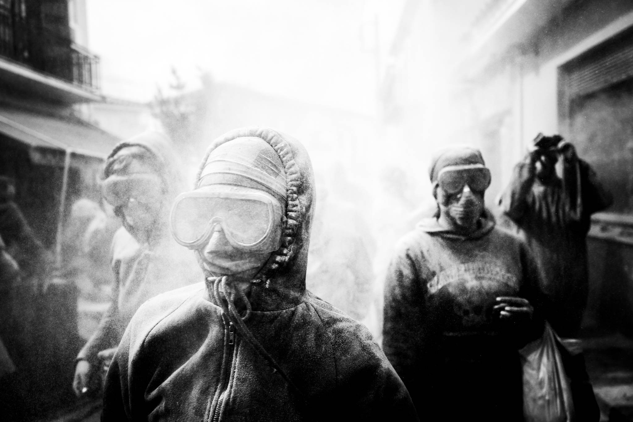 Participants in flour wars, by photographer George Tatakis