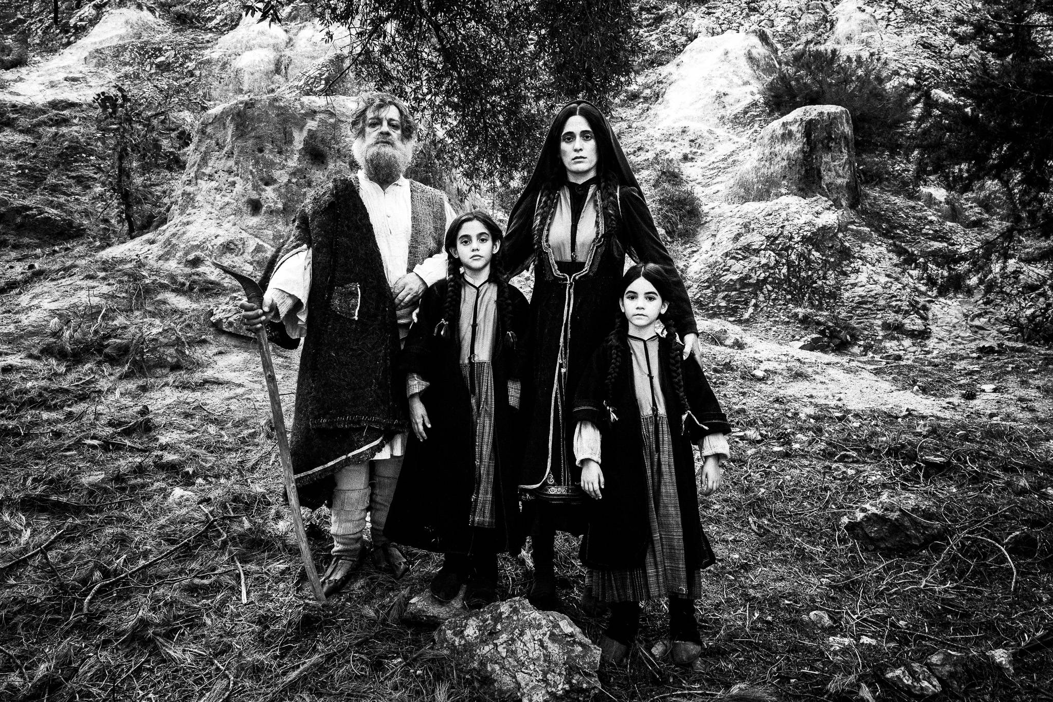 Portrait of a family. Black and white photography by George Tatakis during the filming of 'Φόνισσα'(Fonissa).