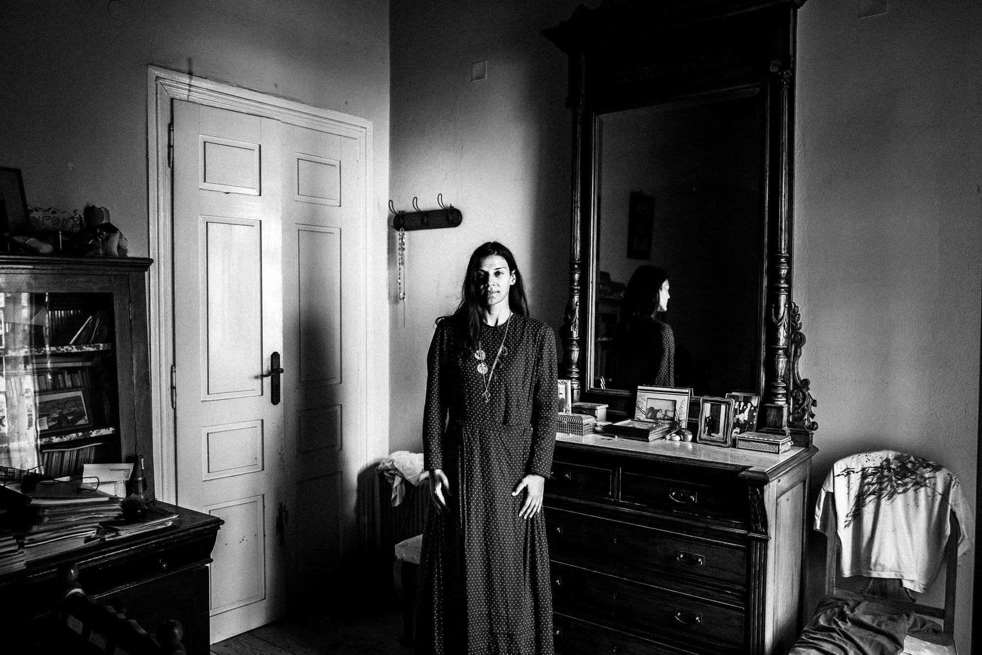 Christina in the traditional urban dress at her home Greece. South Aegean. Kalymnos. © George Tatakis