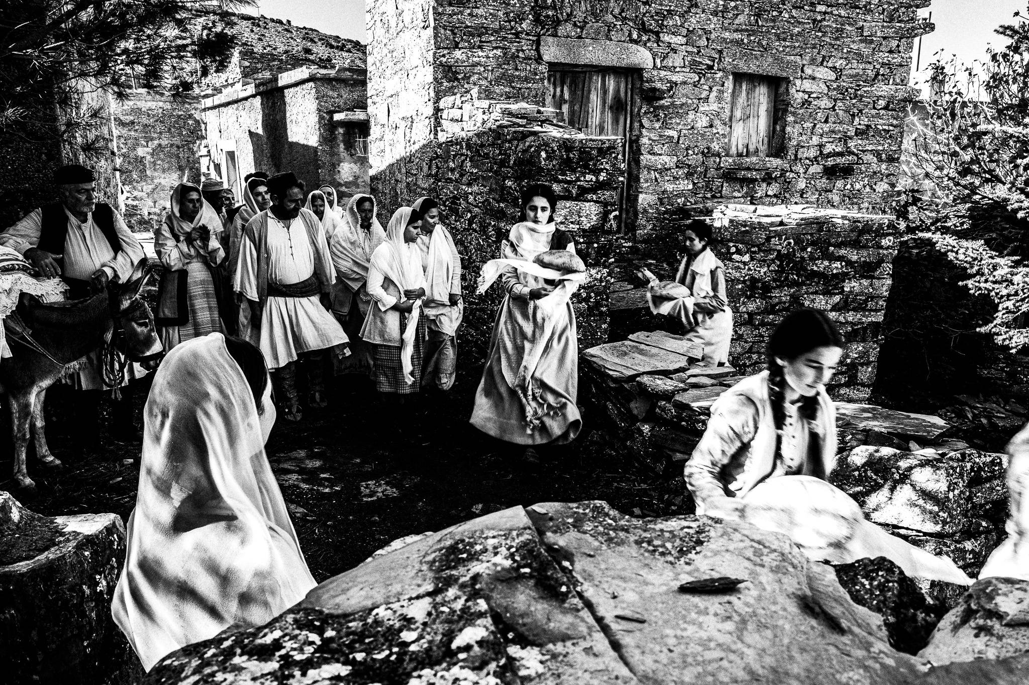 Scene of a local wedding. Black and white photography by George Tatakis during the filming of 'Φόνισσα'(Fonissa).