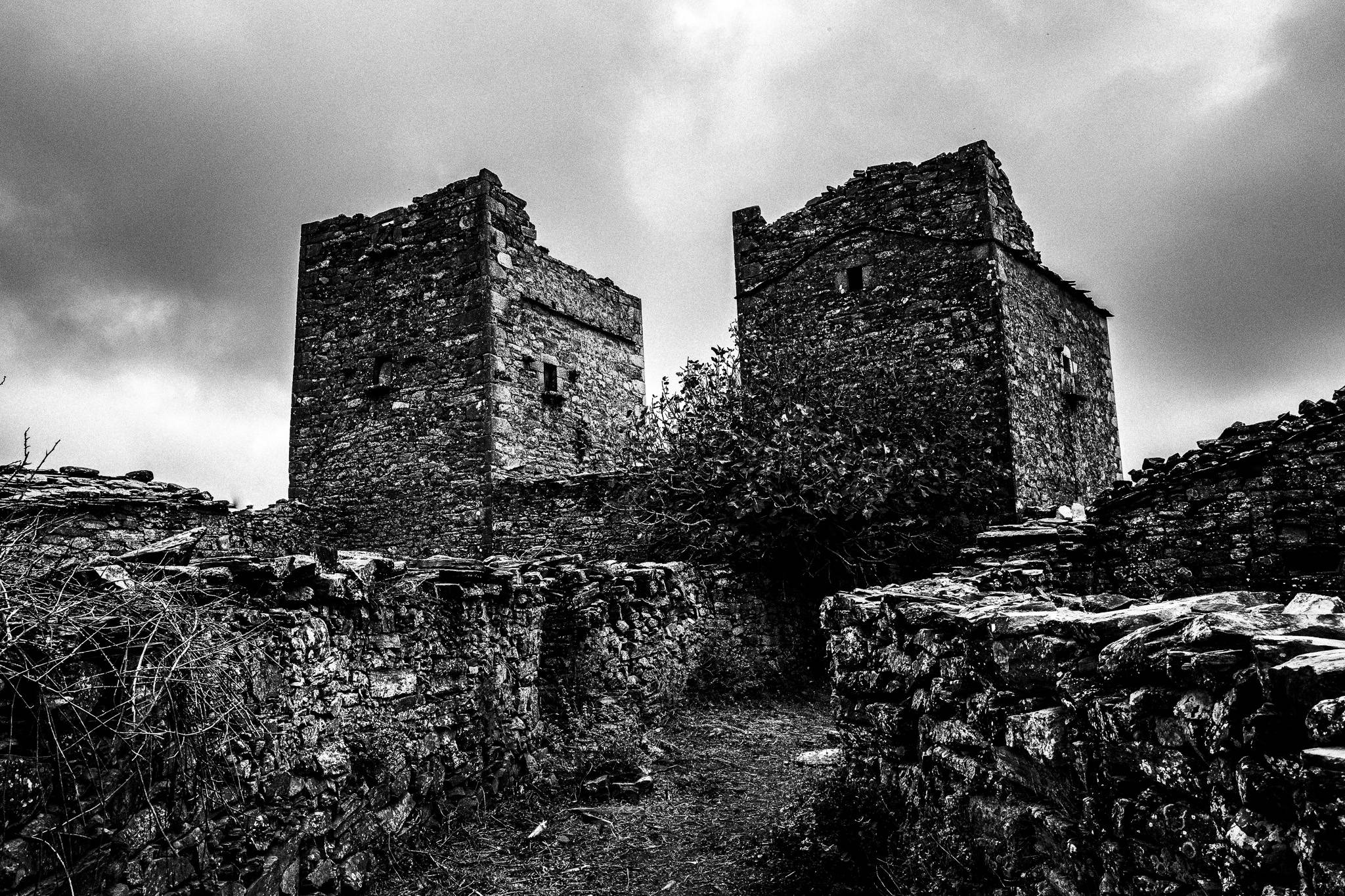Towers at Mountanistika, Mani in the Peloponnese. Black and white photography by George Tatakis during the filming of 'Φόνισσα'(Fonissa).