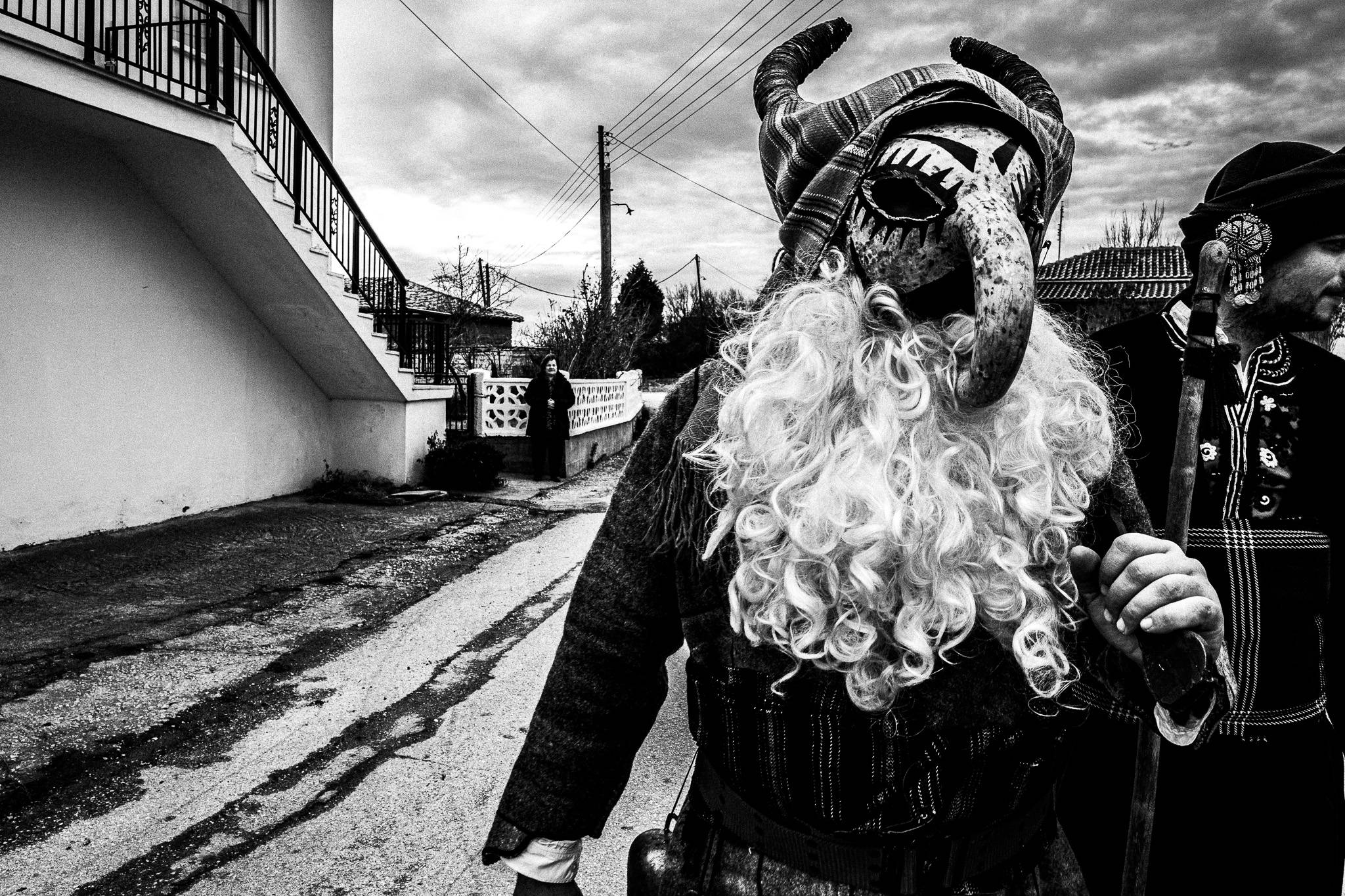 Purpuris visiting houses, Pagan Christmas customs of Northern Greece, by photographer George Tatakis