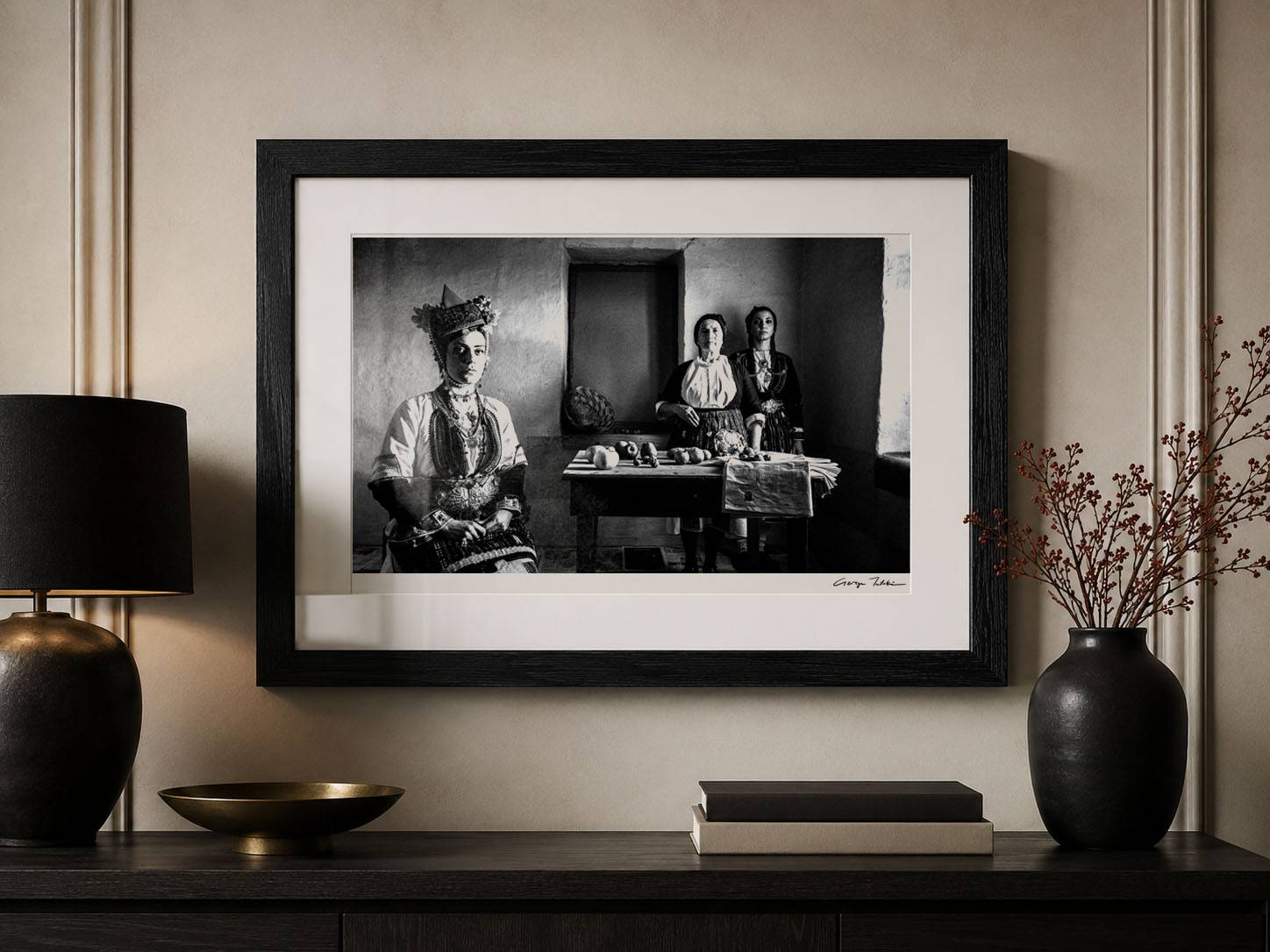 Museum-grade black-and-white fine-art photograph in a black solid oak frame with white mat, displayed in an elegant interior setting.