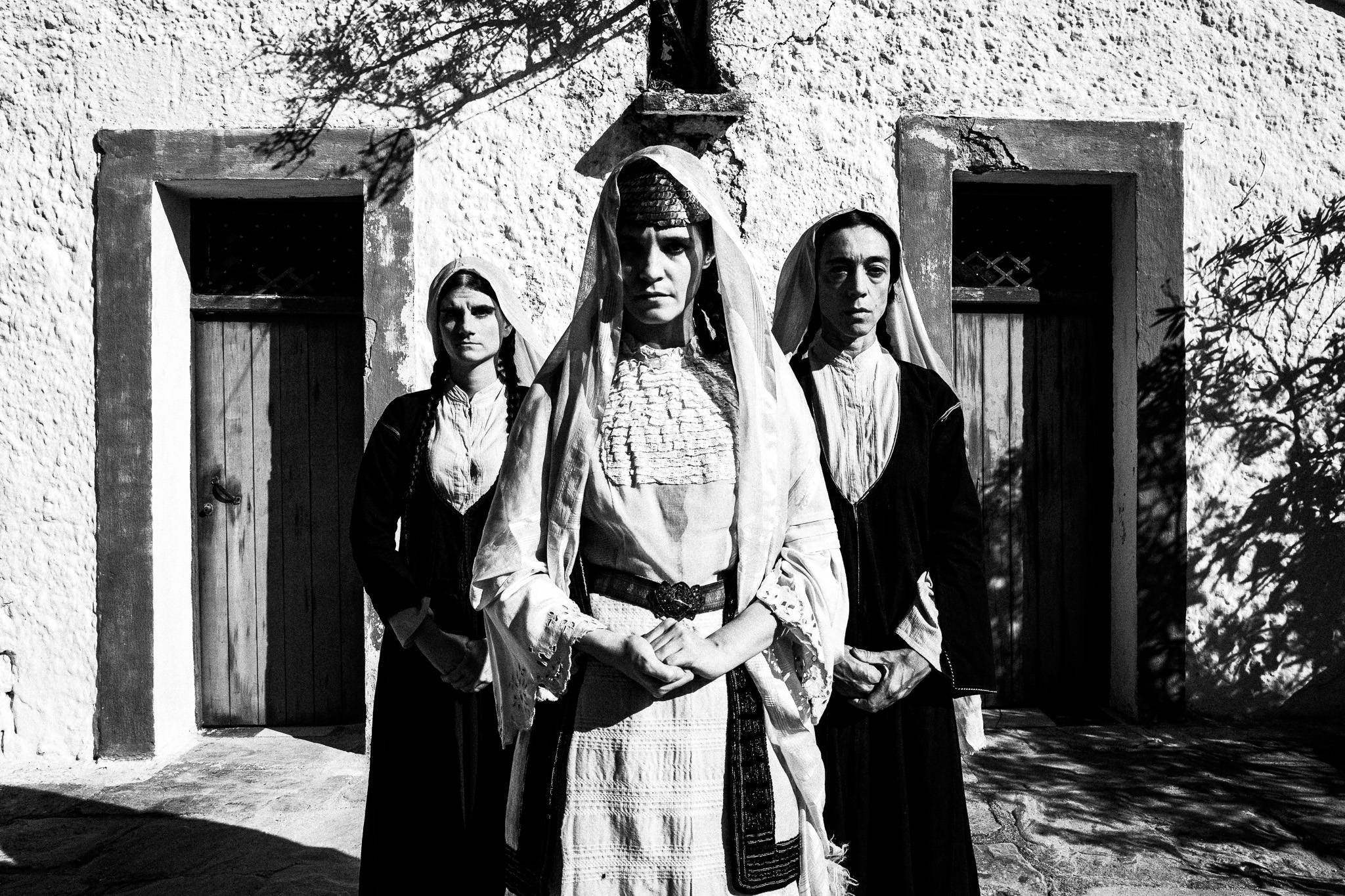Bride with her Sisters. Black and white photography by George Tatakis during the filming of 'Φόνισσα'(Fonissa).