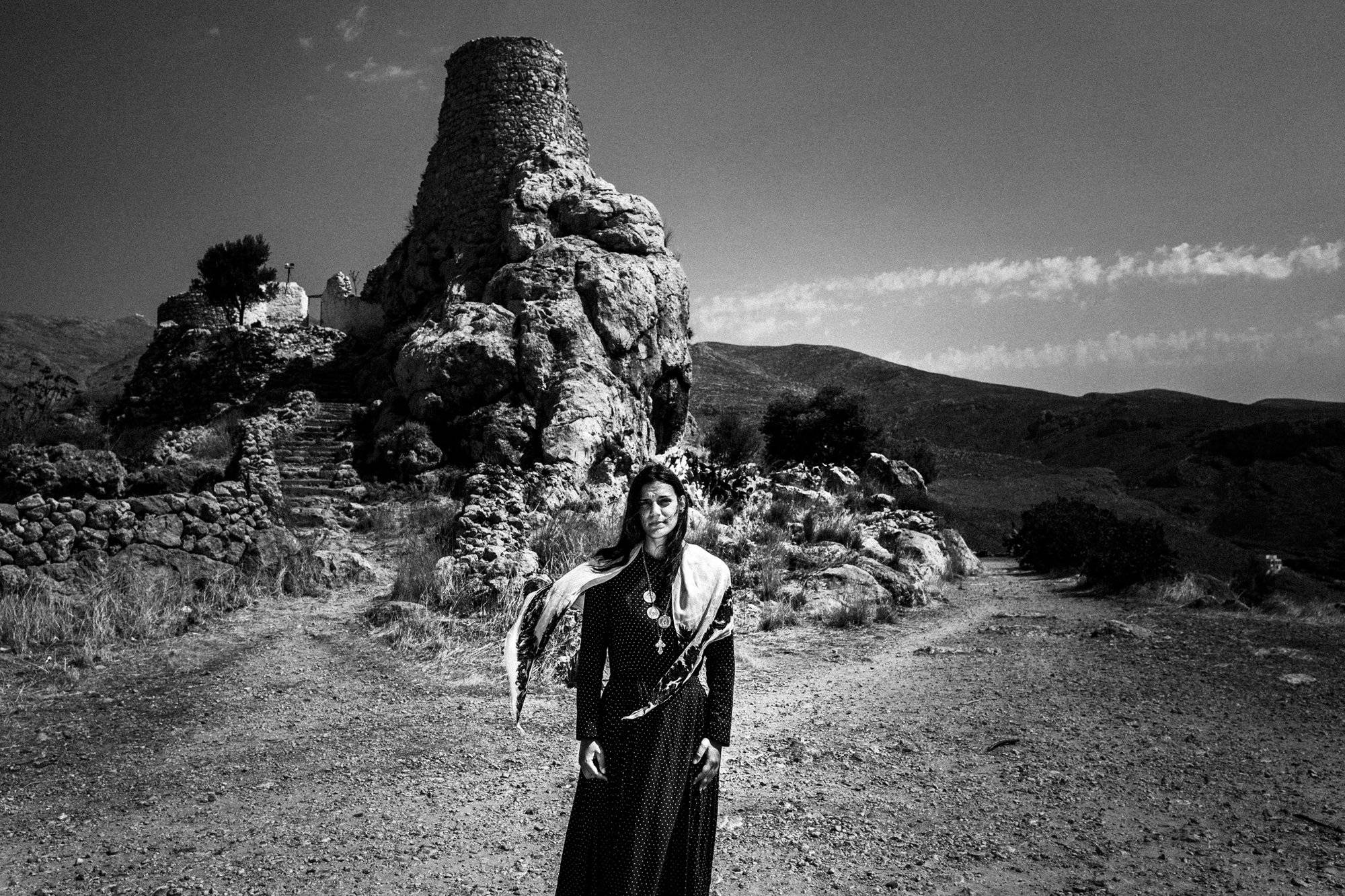 Christina in the traditional urban dress. Kalymnos, Greece by photographer George Tatakis