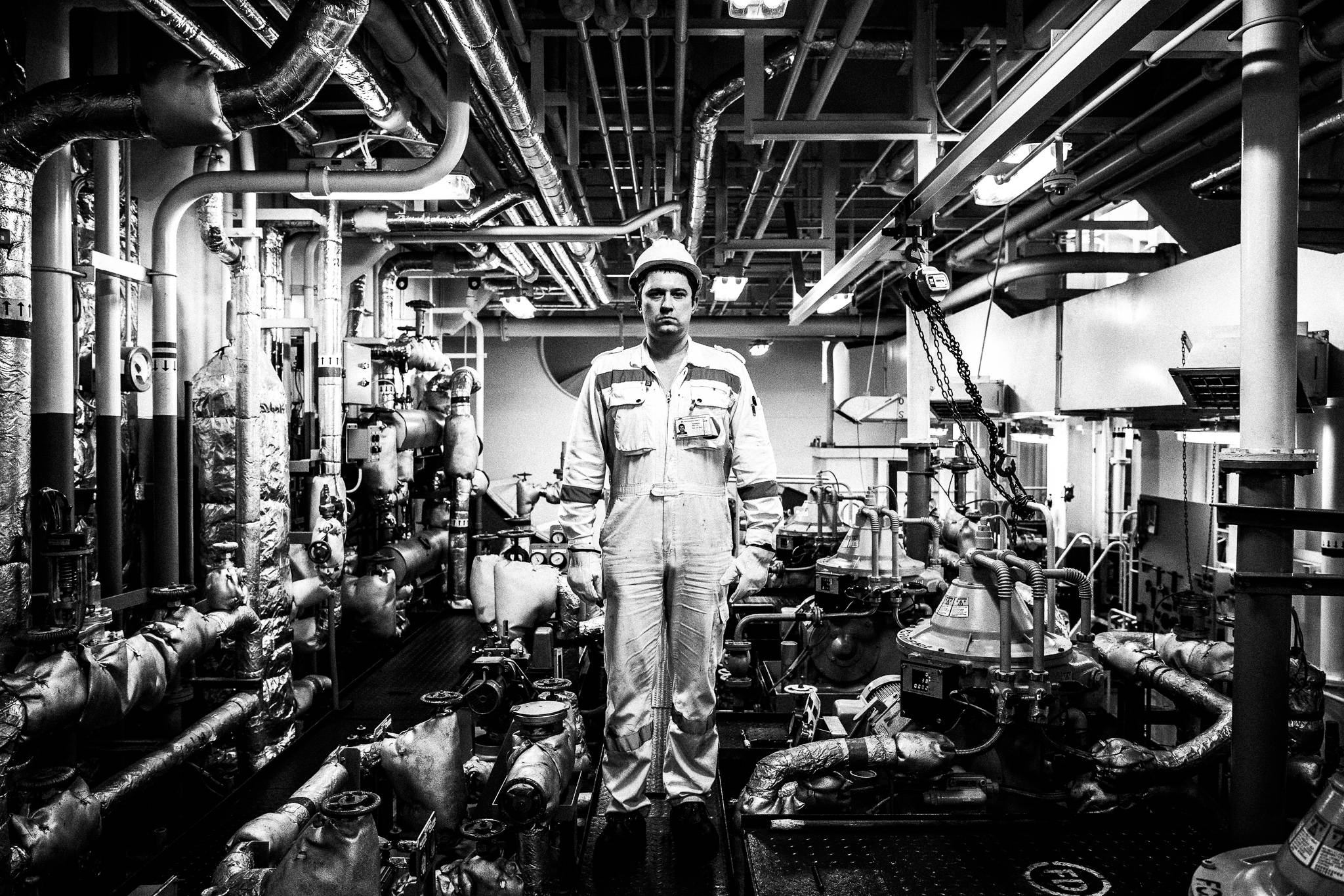 Engineer in the oil / fuel separator by photographer George Tatakis