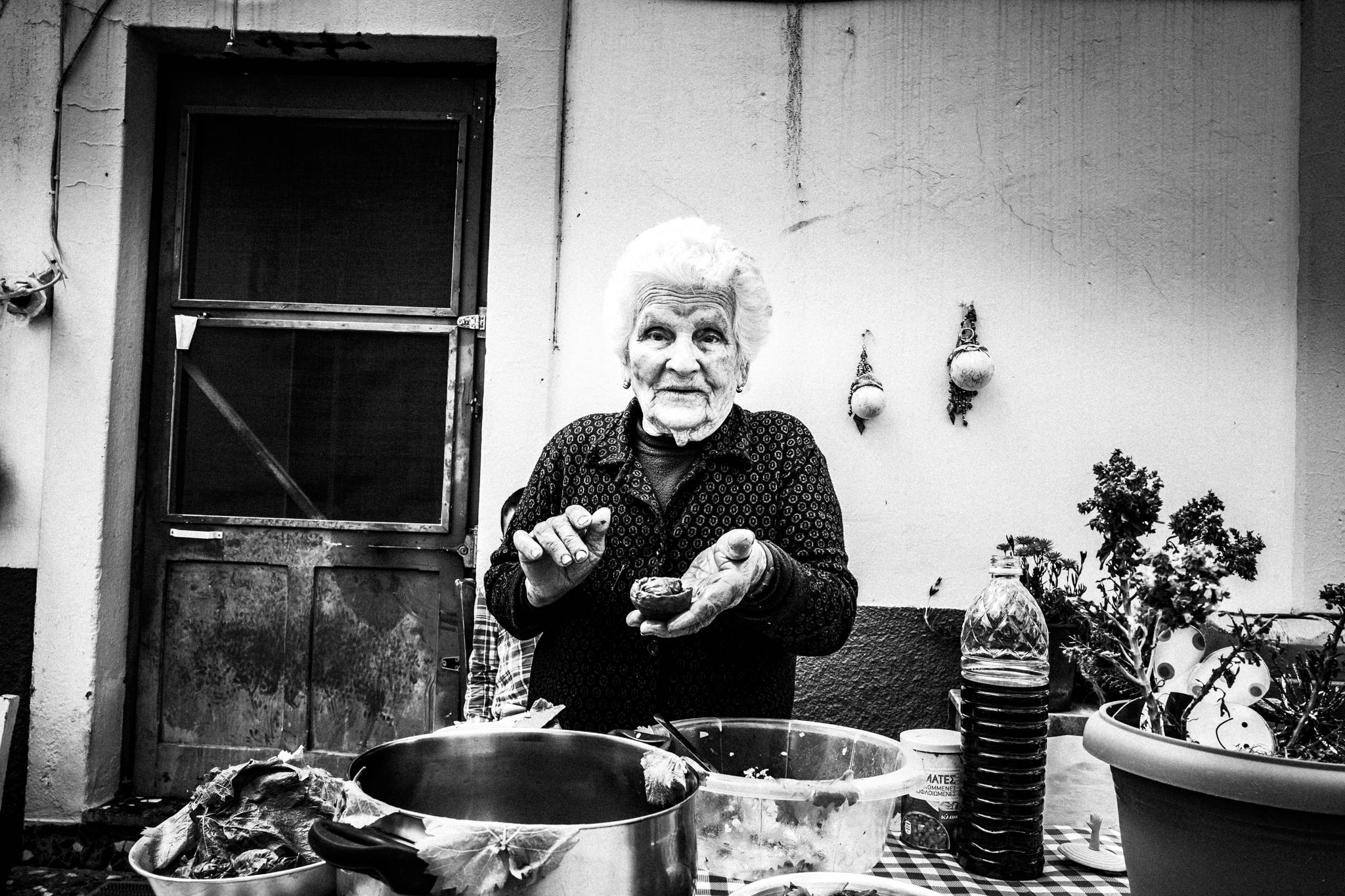 Chryssi preparing giaprakia in Patmos by photographer George Tatakis