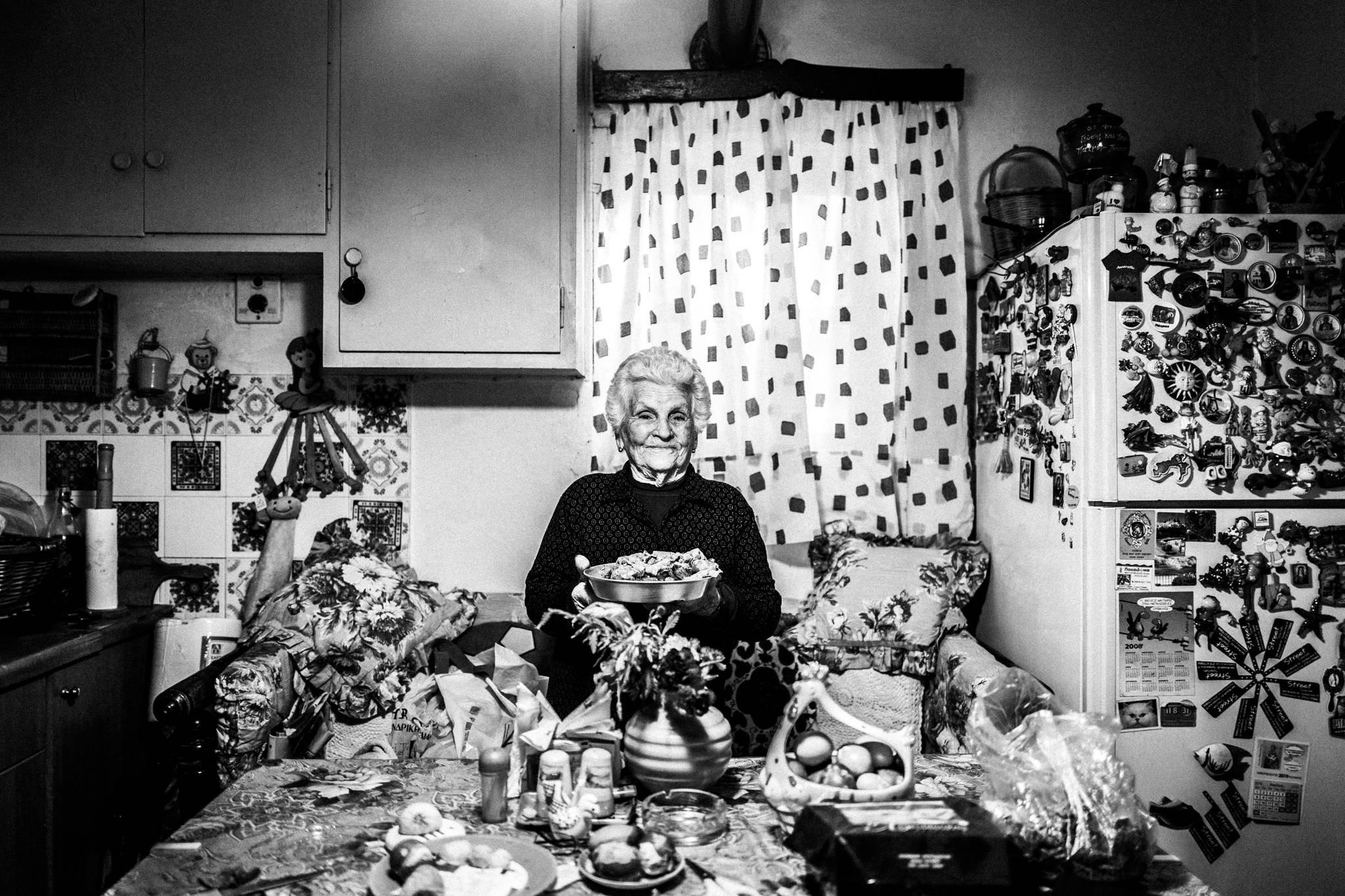 Chryssi preparing giaprakia in Patmos by photographer George Tatakis