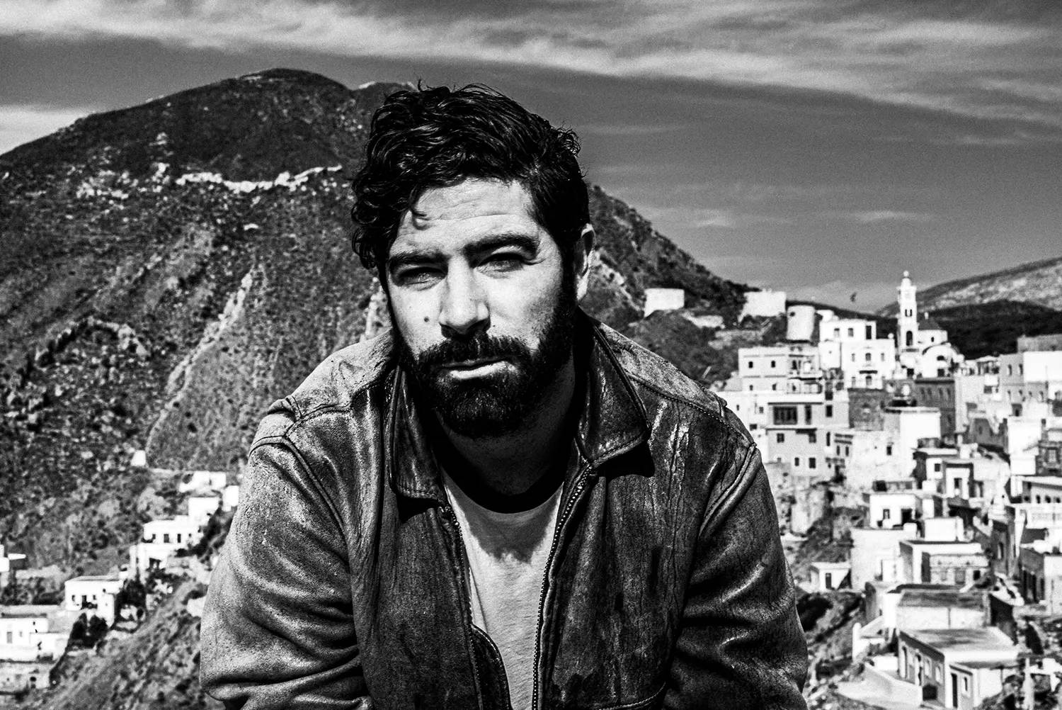 Yannis Philippakis (Foals) at Olympos, Karpathos isnald, Greece, by photographer George Tatakis