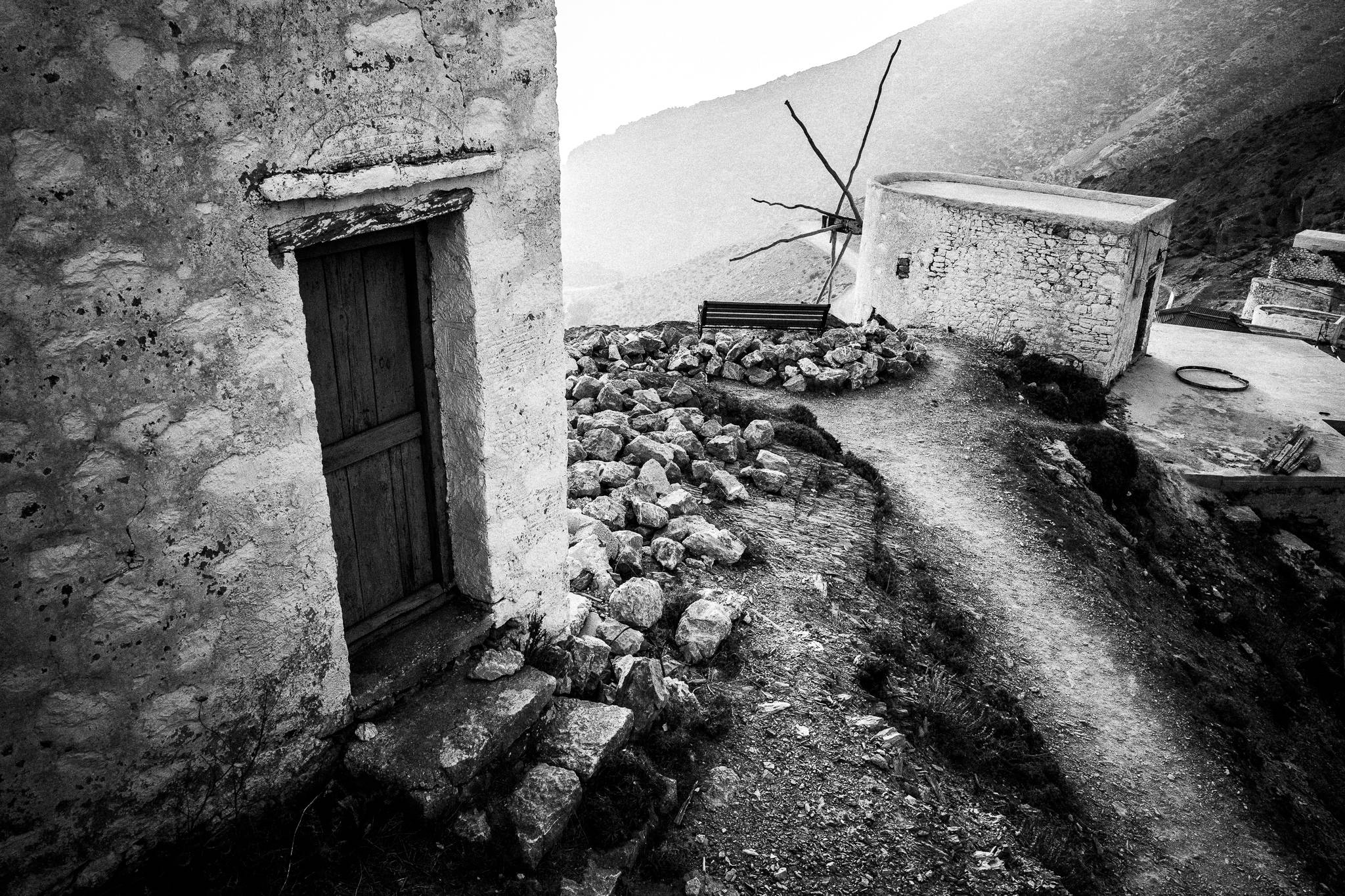 Local Mills in Olympos, Karpathos, Greece. Black and white photography by George Tatakis