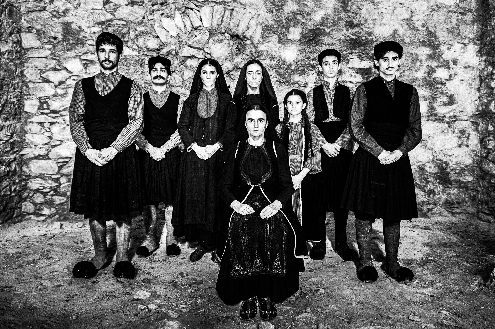 Hadoula (Karyofillia Karabetis) with her family, posing for the film 'Fonissa'. Black and white photography by George Tatakis during the filming of 'Φόνισσα'(Fonissa).