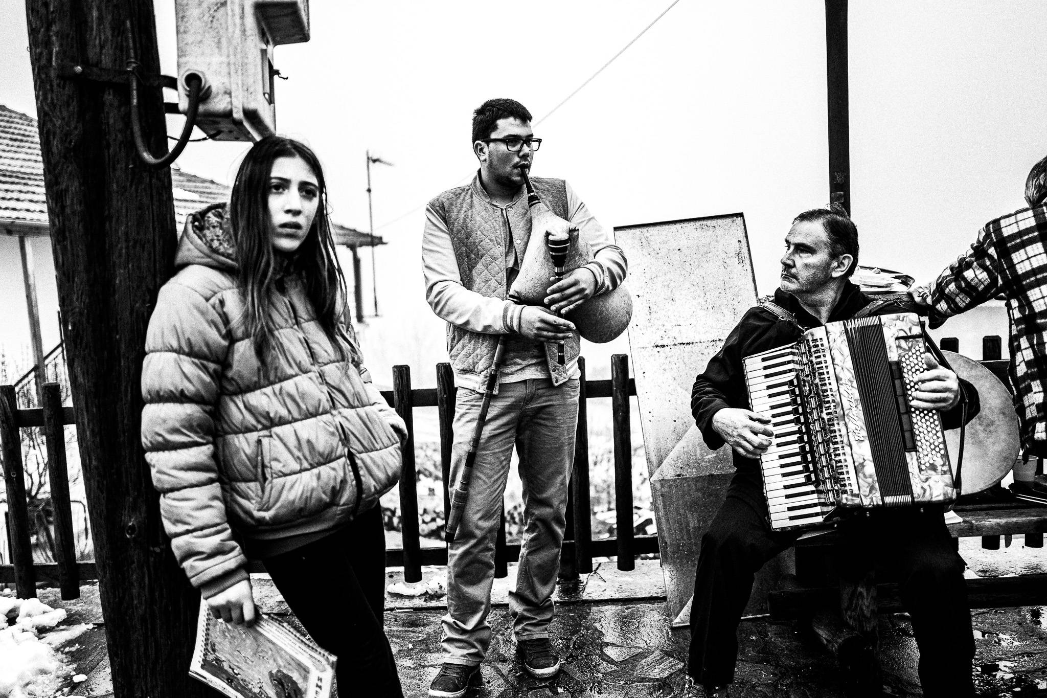 Playing music for the custom, Pagan Christmas customs of Northern Greece, by photographer George Tatakis
