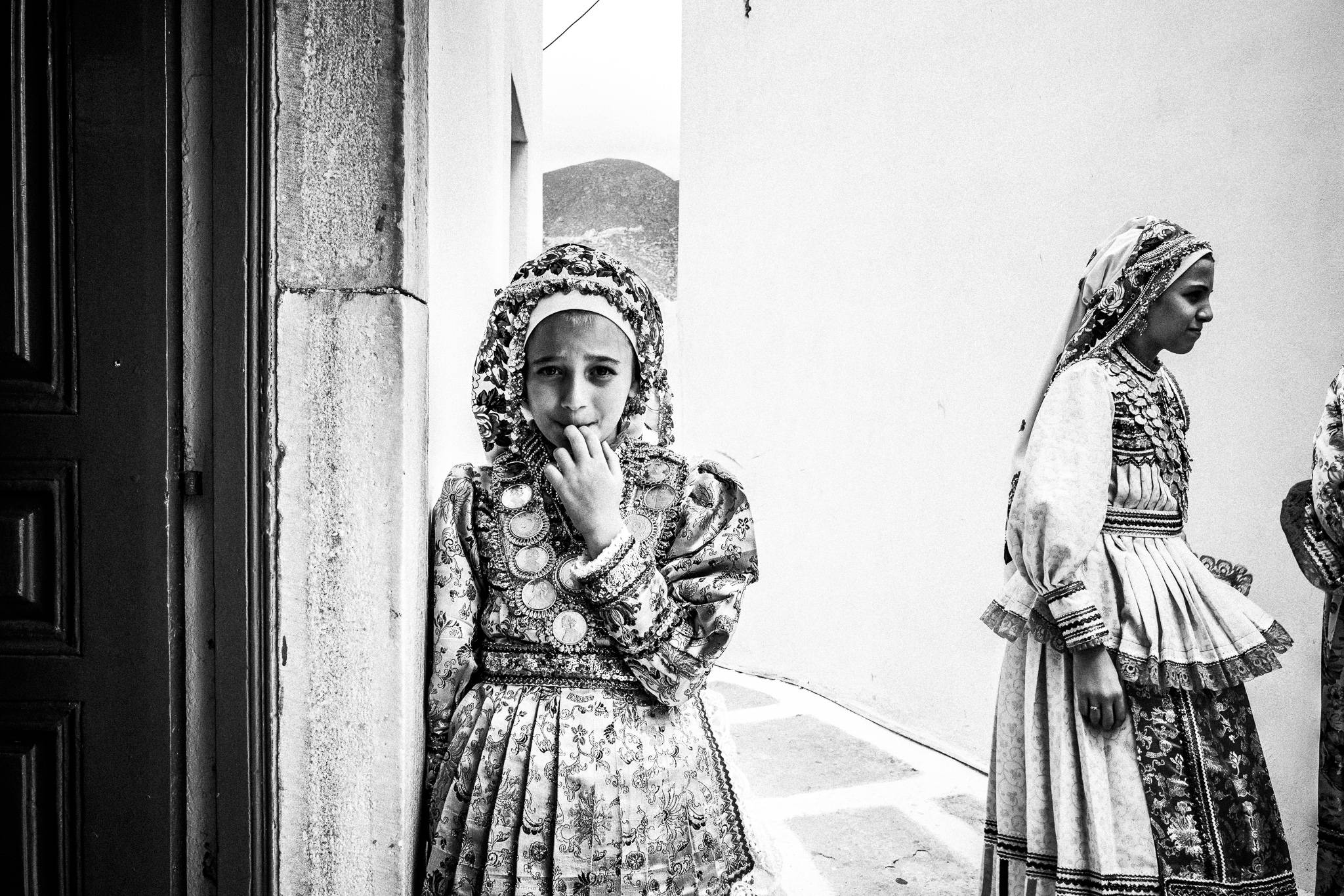 Young girl in Sakofoustano in Olympos, Karpathos, Greece. Black and white photography by George Tatakis