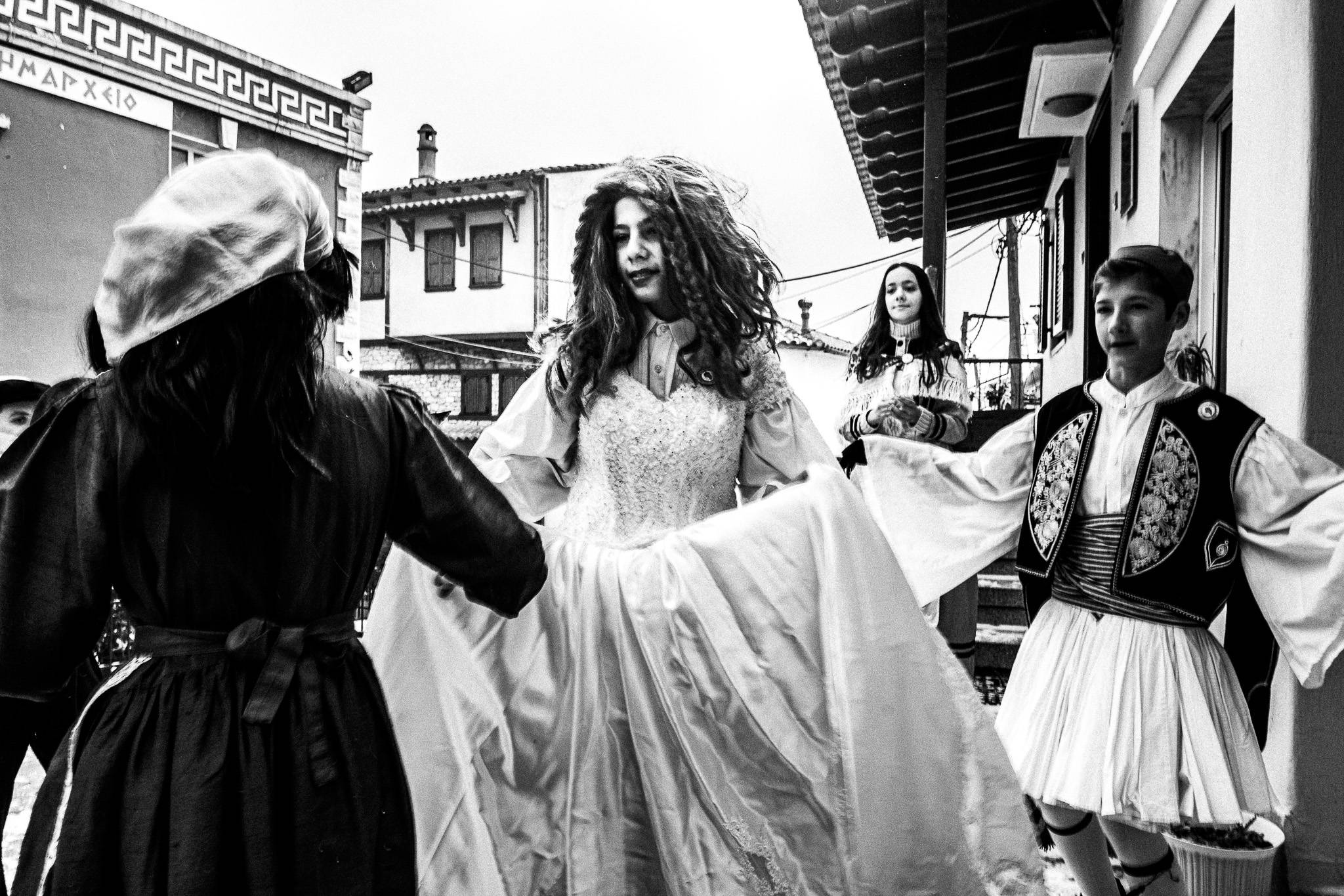 The couple at the village, Pagan Christmas customs of Northern Greece, by photographer George Tatakis
