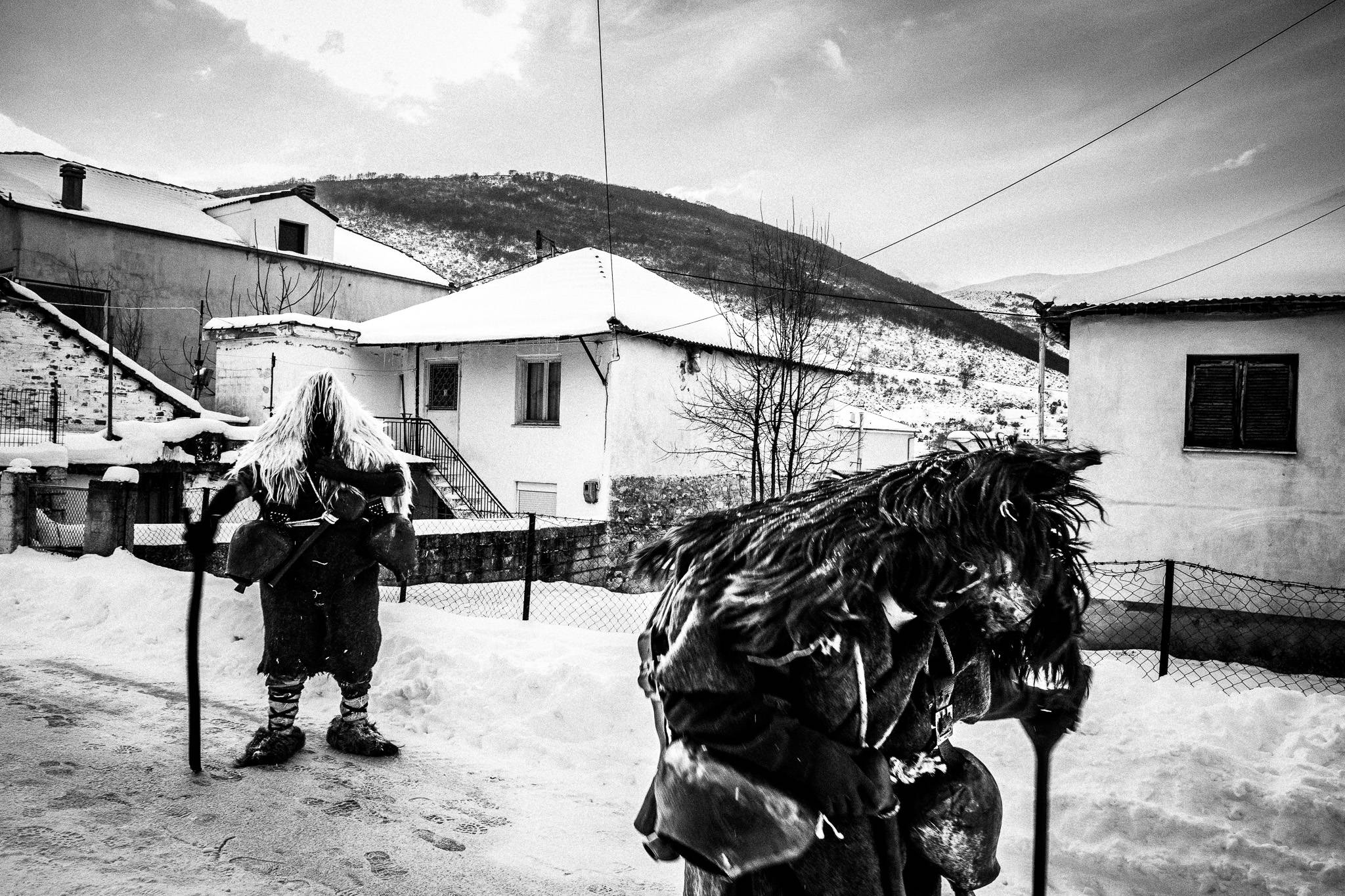 Arapides walking, Pagan Christmas customs of Northern Greece, by photographer George Tatakis