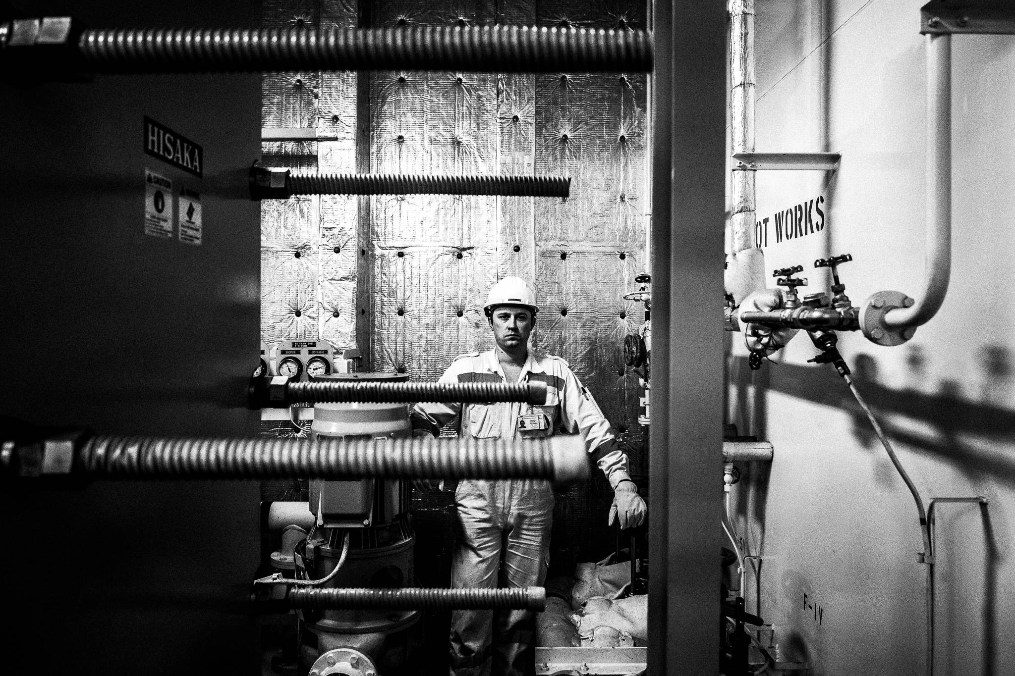 Engineer in the fresh water pump by photographer George Tatakis