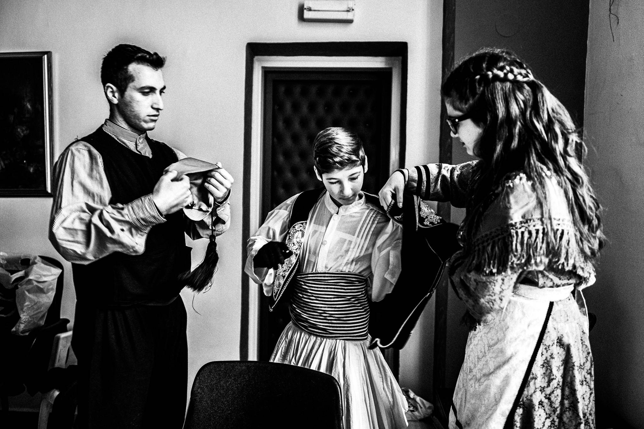 Dressing up the "groom", Pagan Christmas customs of Northern Greece, by photographer George Tatakis