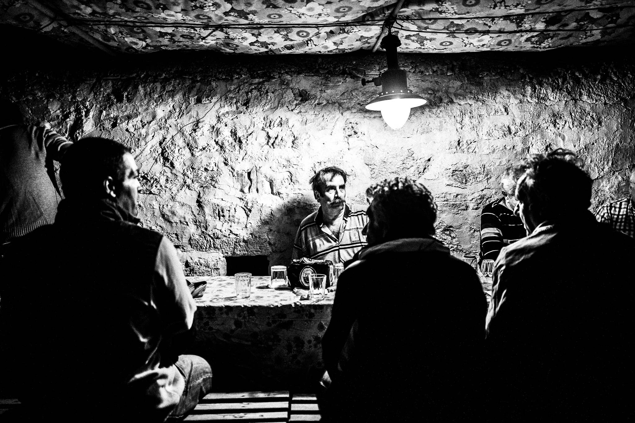 Nostalgia at the celebrations during the festival of St. Zacharias at Argos on the island of Saria, Olympos, Karpathos, Greece. Black and white photography by George Tatakis