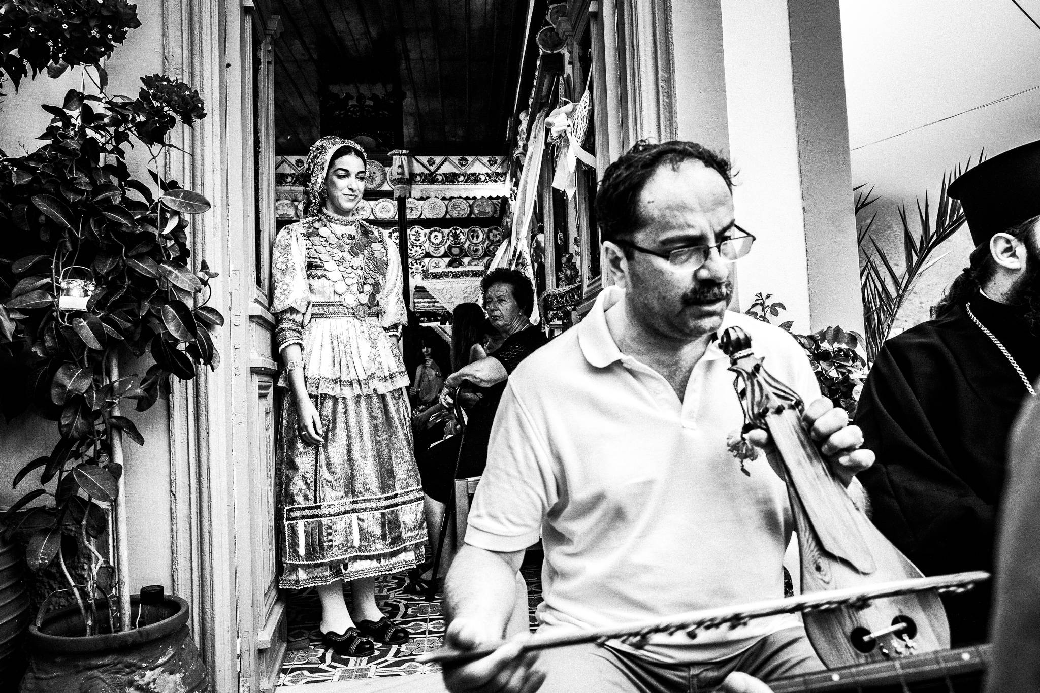 Bride-to-be waits in Olympos, Karpathos, Greece. Black and white photography by George Tatakis