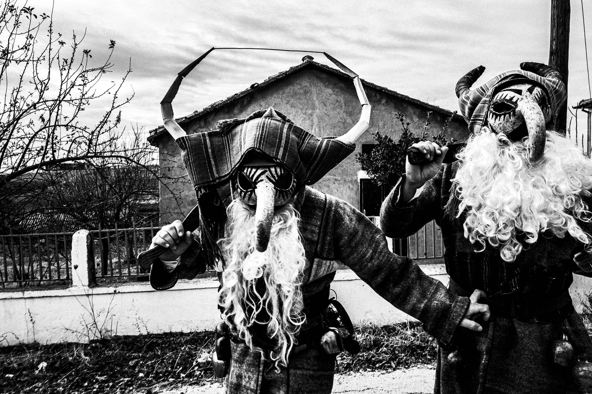 Purpuris dancing traditional dances, Pagan Christmas customs of Northern Greece, by photographer George Tatakis