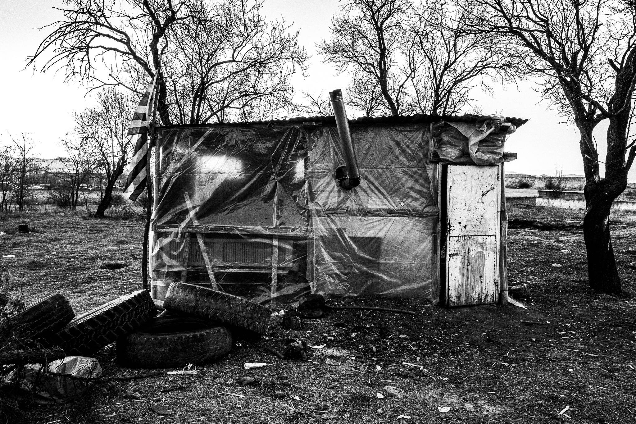 The shack, serving as shelter for the bonfire builders, Pagan Christmas customs of Northern Greece, by photographer George Tatakis