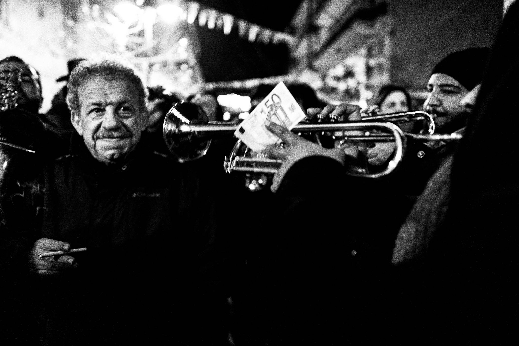 A trumpetist playing, Pagan Christmas customs of Northern Greece, by photographer George Tatakis