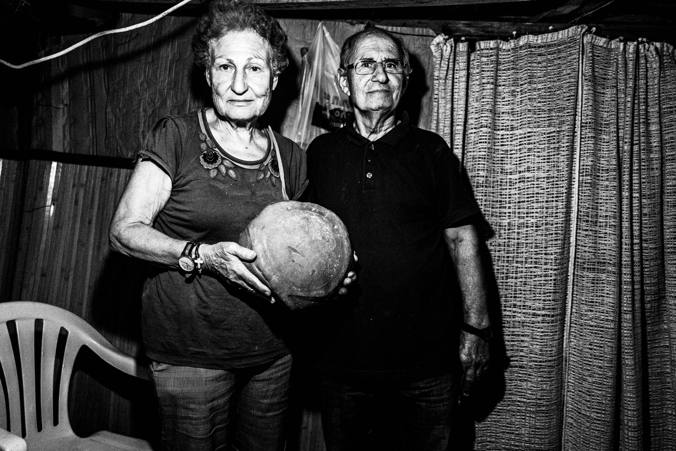 The couple I met during the celebration of Panagia Charakiani, Rethymnon, Crete, by photographer George Tatakis