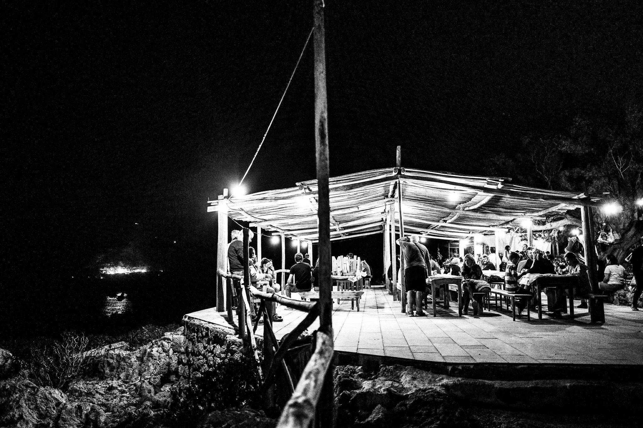 The celebration camp at the feast of Saint John at the site of the ancient city of Brykous, Olympos, Karpathos, Greece. Black and white photography by George Tatakis