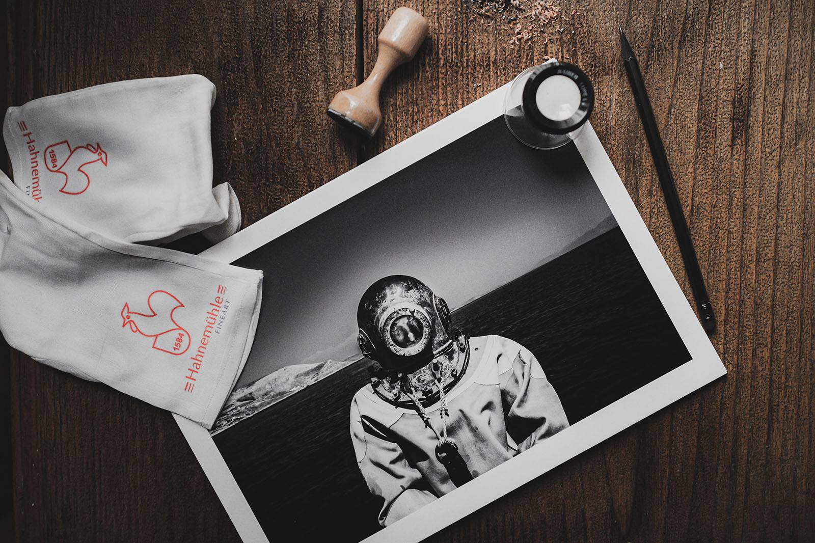Photographer showcasing various add-on services like prints and albums