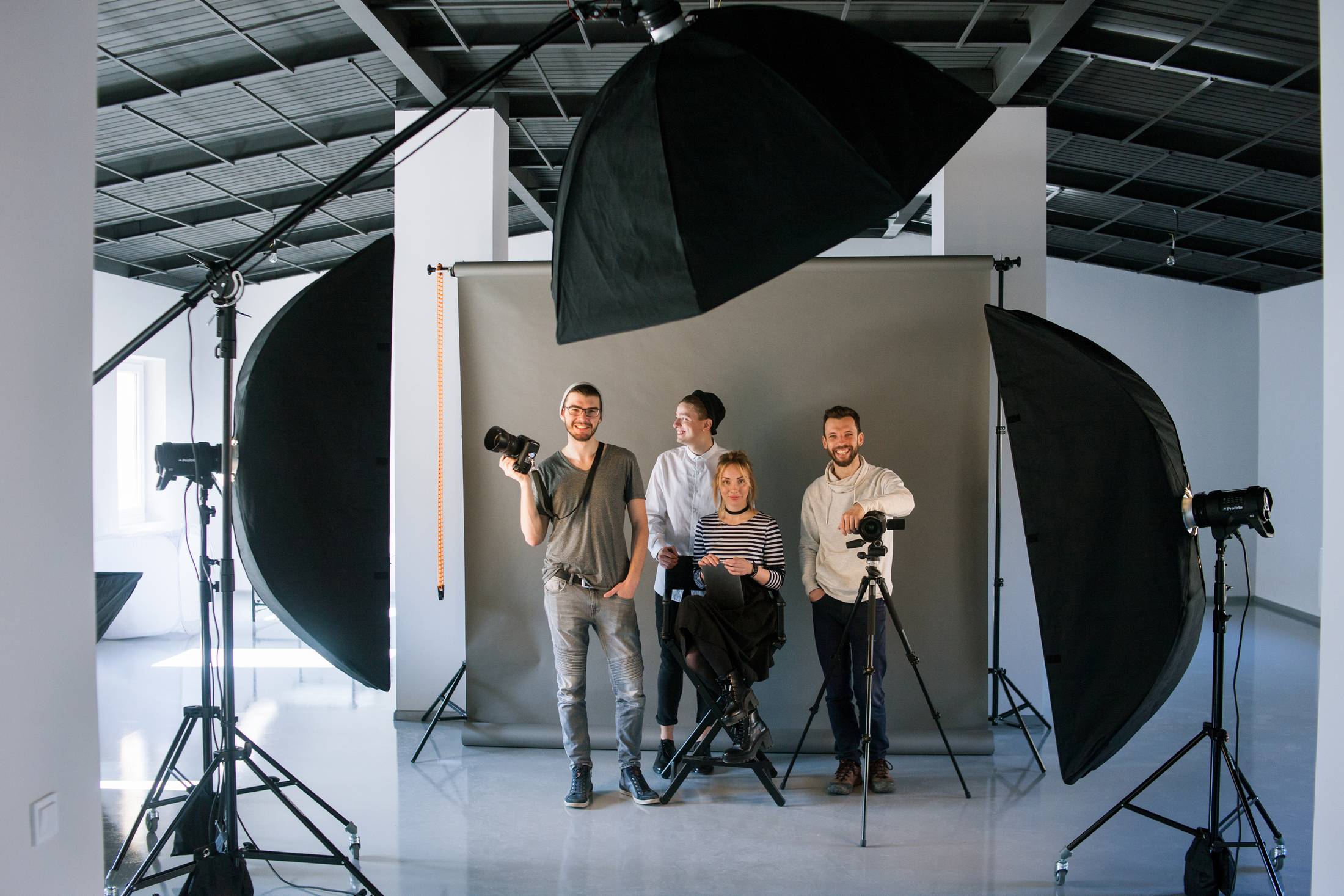 Client meeting with photographer discussing benefits of professional photos