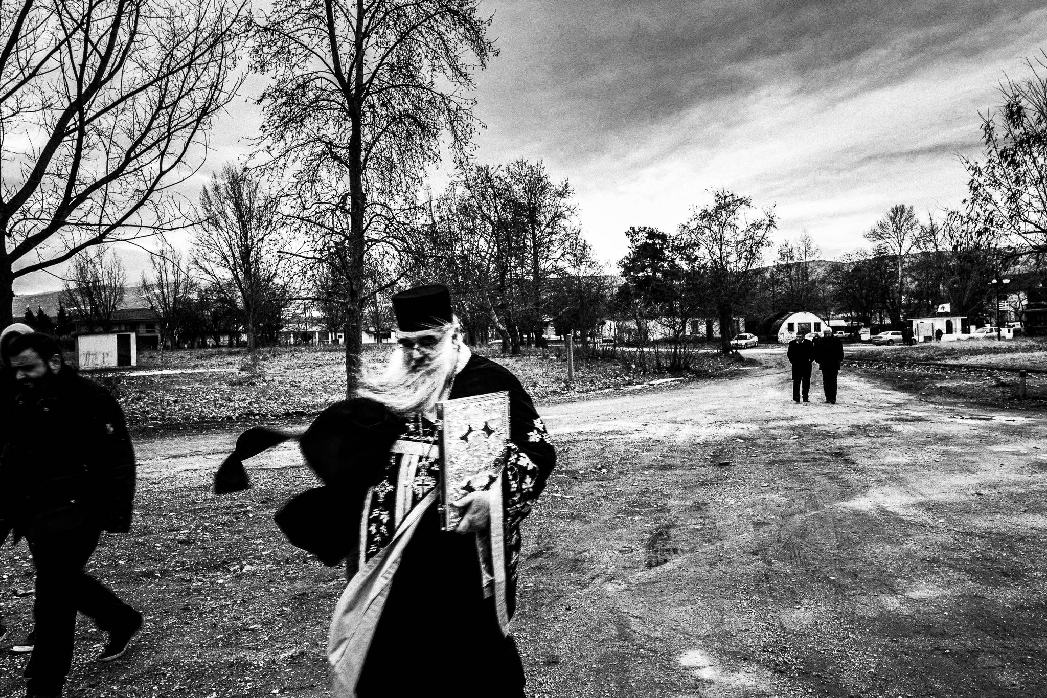 The priest arriving, Pagan Christmas customs of Northern Greece, by photographer George Tatakis