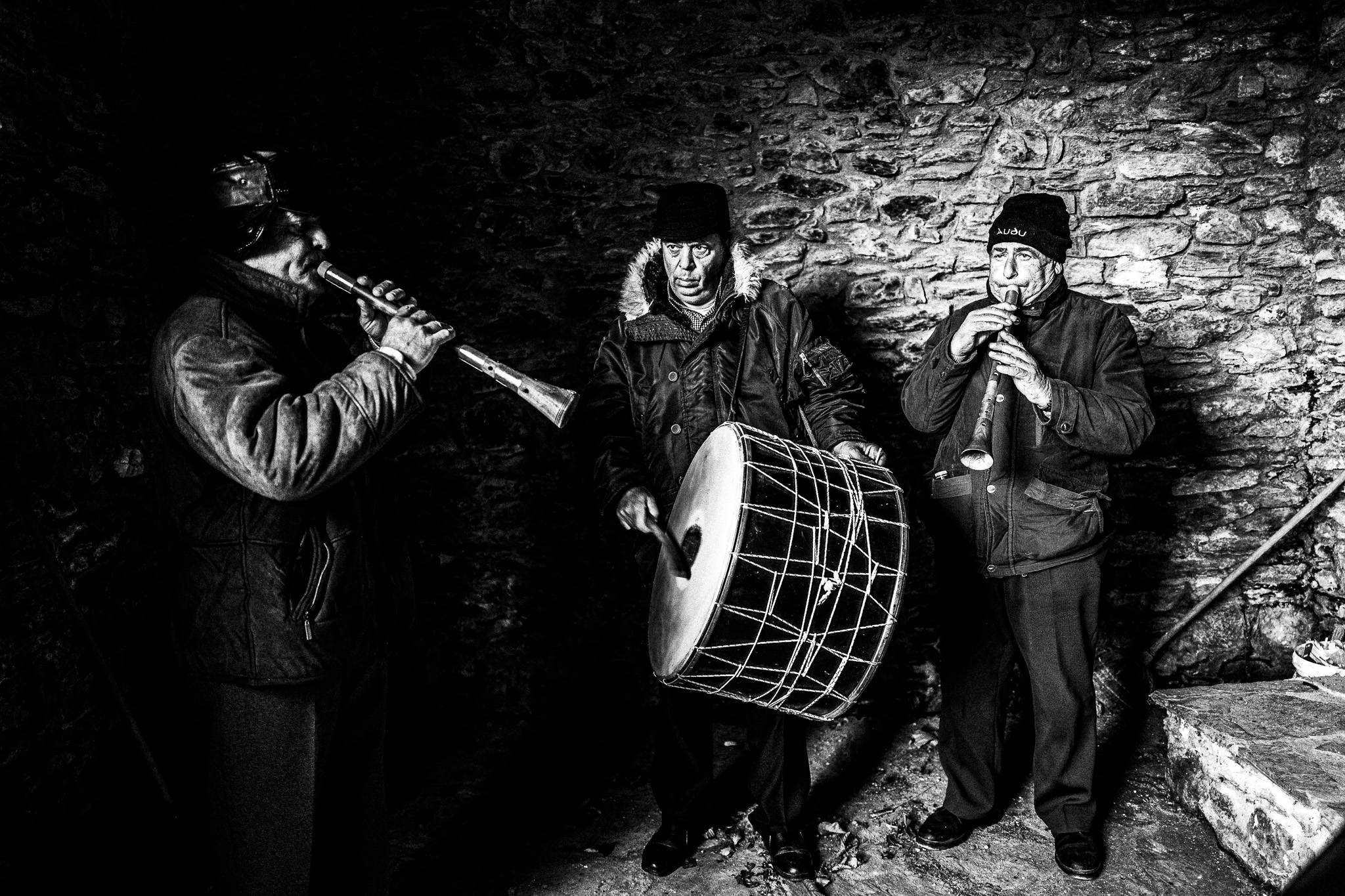Musicians at Klisoura, Pagan Christmas customs of Northern Greece, by photographer George Tatakis
