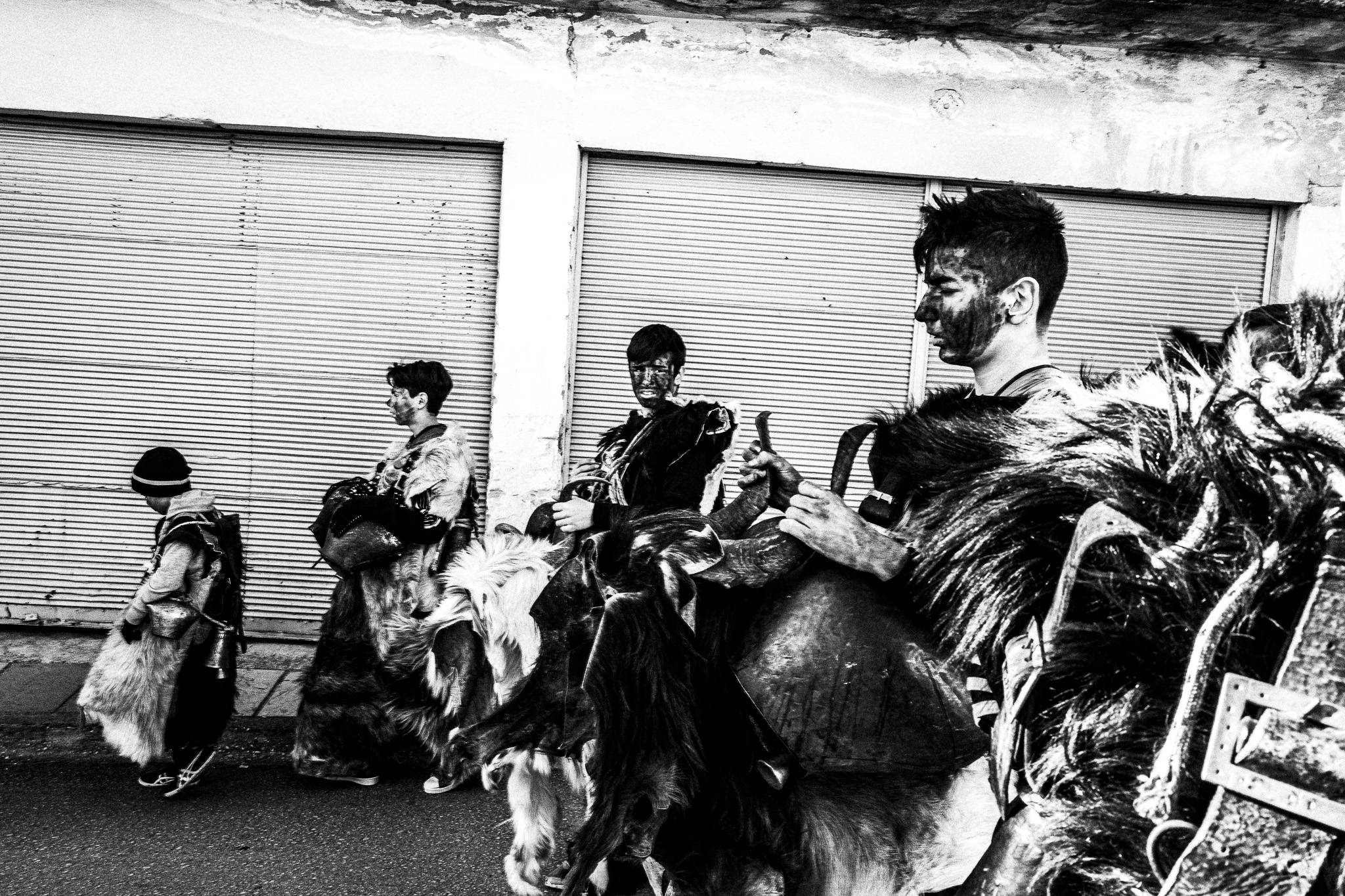 Arapides in the streets, Pagan Christmas customs of Northern Greece, by photographer George Tatakis