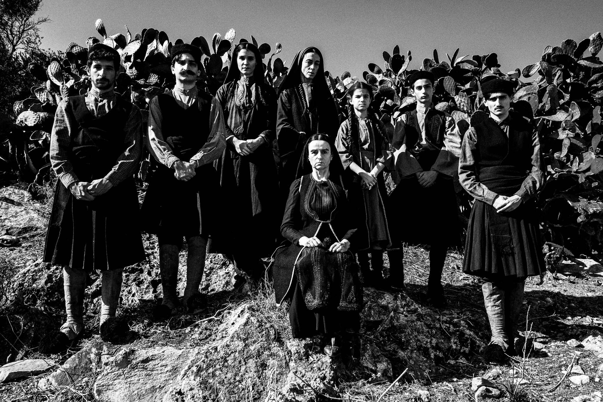 Hadoula (Karyofillia Karabetis) posing with her family. Black and white photography by George Tatakis during the filming of 'Φόνισσα'(Fonissa).