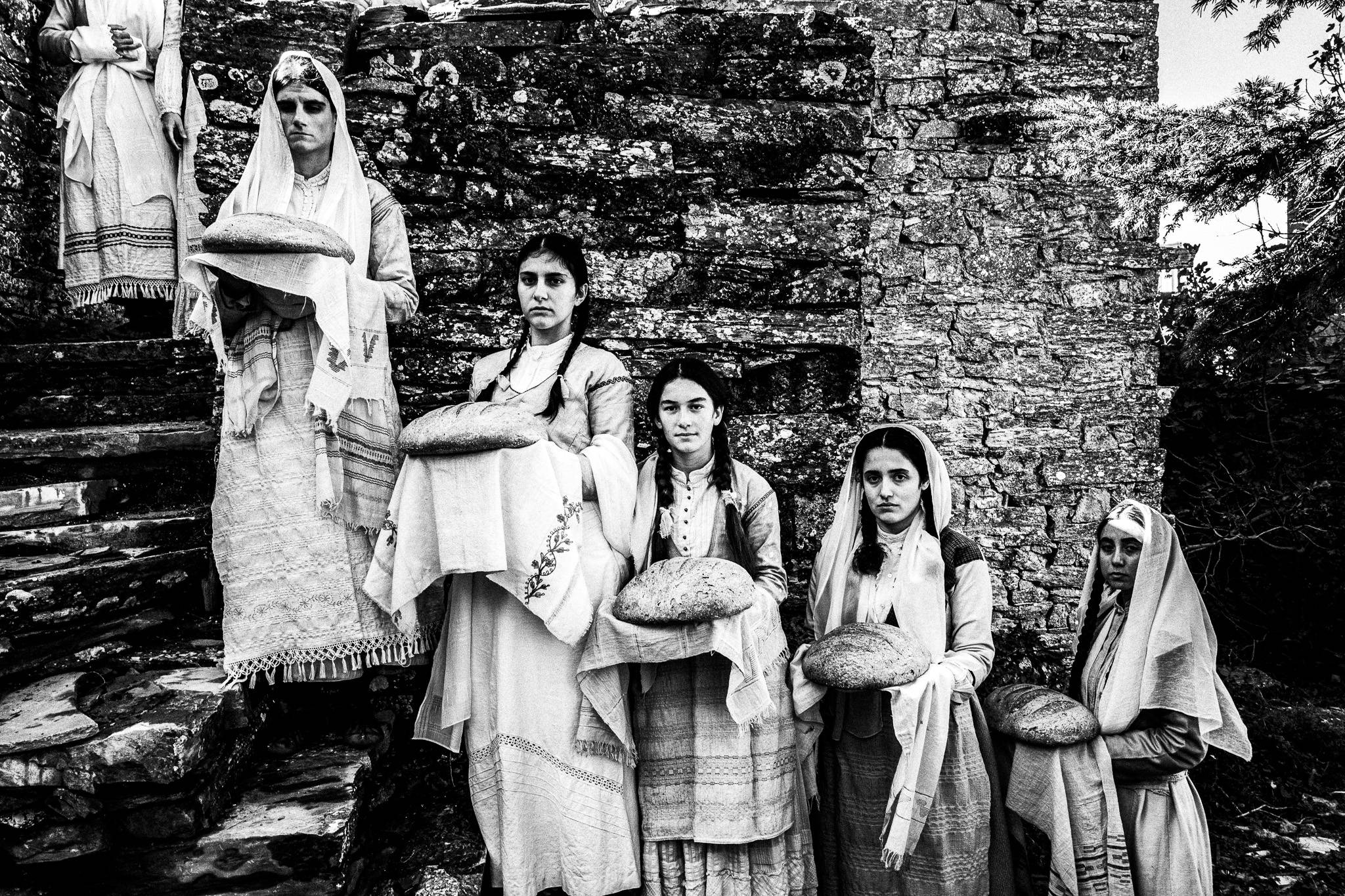 Scene of a local wedding. Black and white photography by George Tatakis during the filming of 'Φόνισσα'(Fonissa).