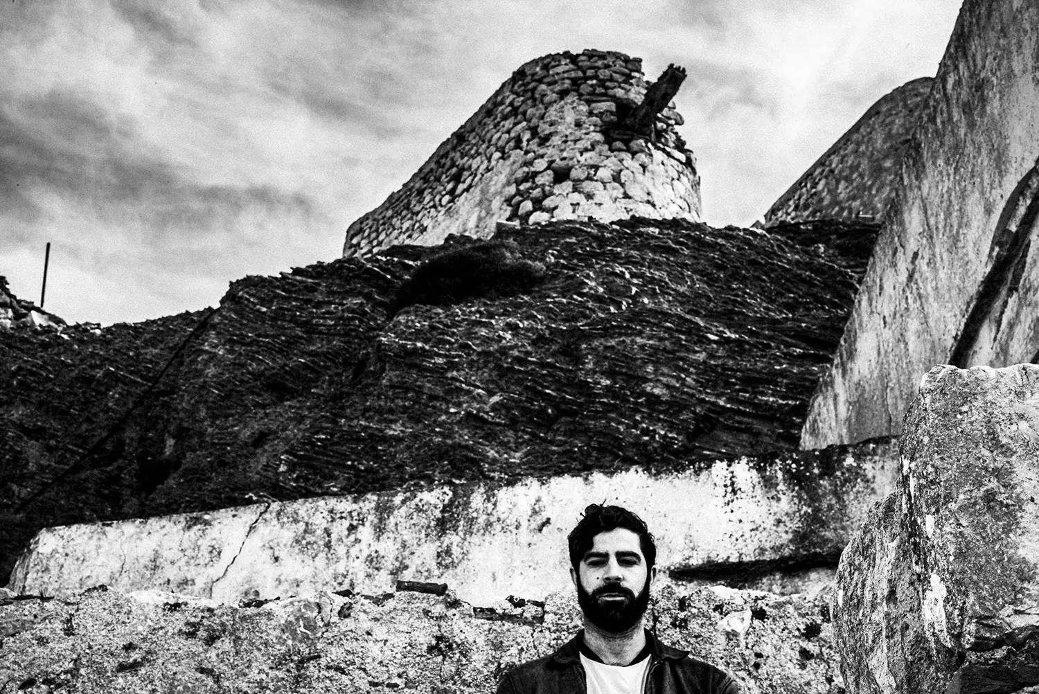 Yannis Philippakis (Foals) around Olympos in Karpathos island, Greece, by photographer George Tatakis