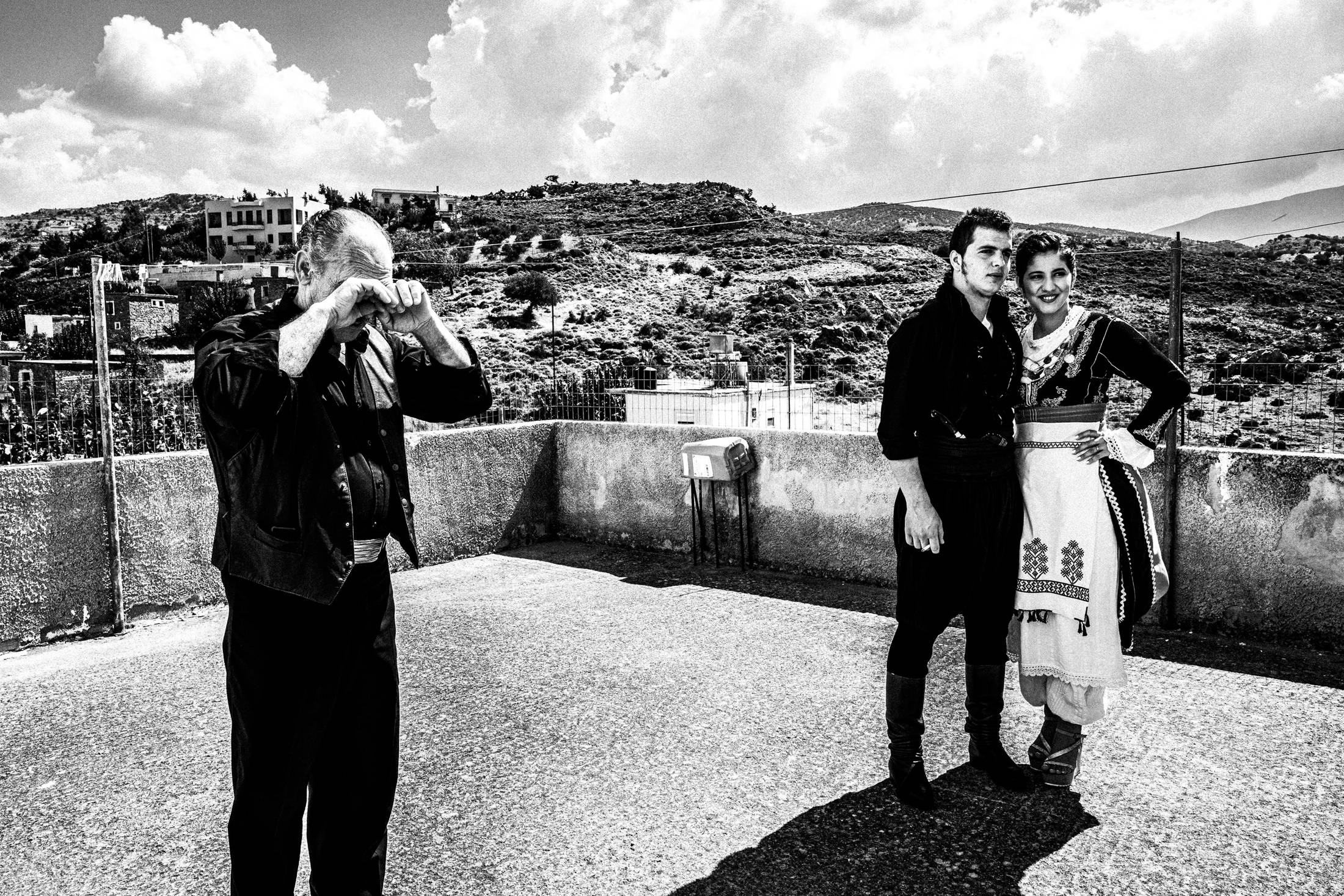 Family and friends before the wedding, Anogia, Rethymnon, Crete, by photographer George Tatakis