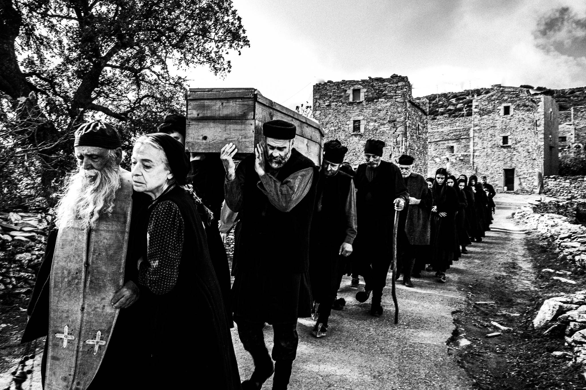 Fonissa: Funeral procession. Black and white photography by George Tatakis during the filming of 'Φόνισσα'(Fonissa).