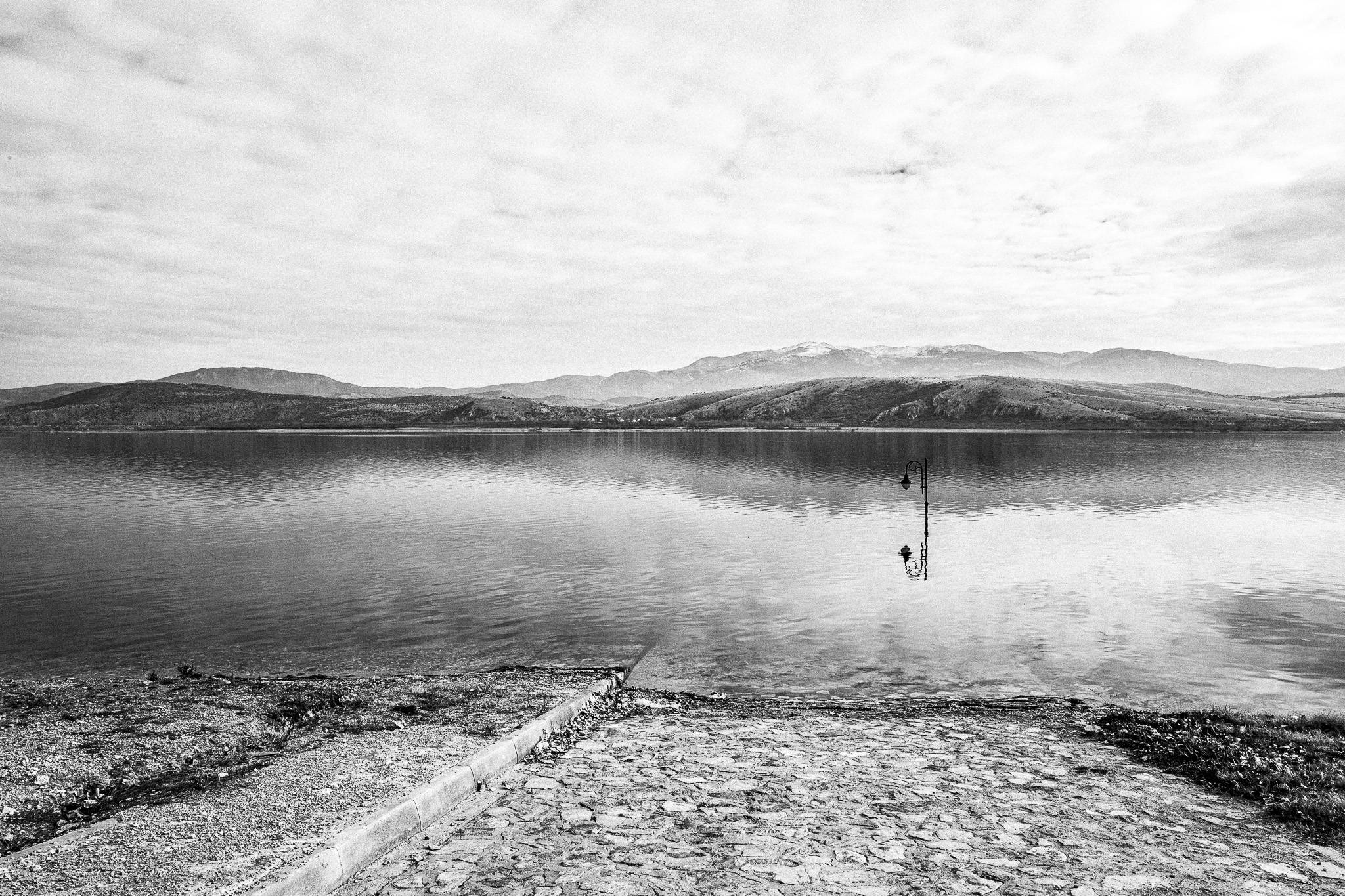 Vegoritida lake, Pagan Christmas customs of Northern Greece, by photographer George Tatakis