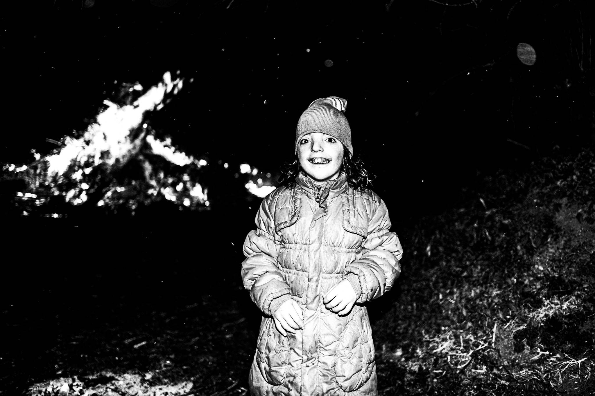 Enjoying the fire, Pagan Christmas customs of Northern Greece, by photographer George Tatakis