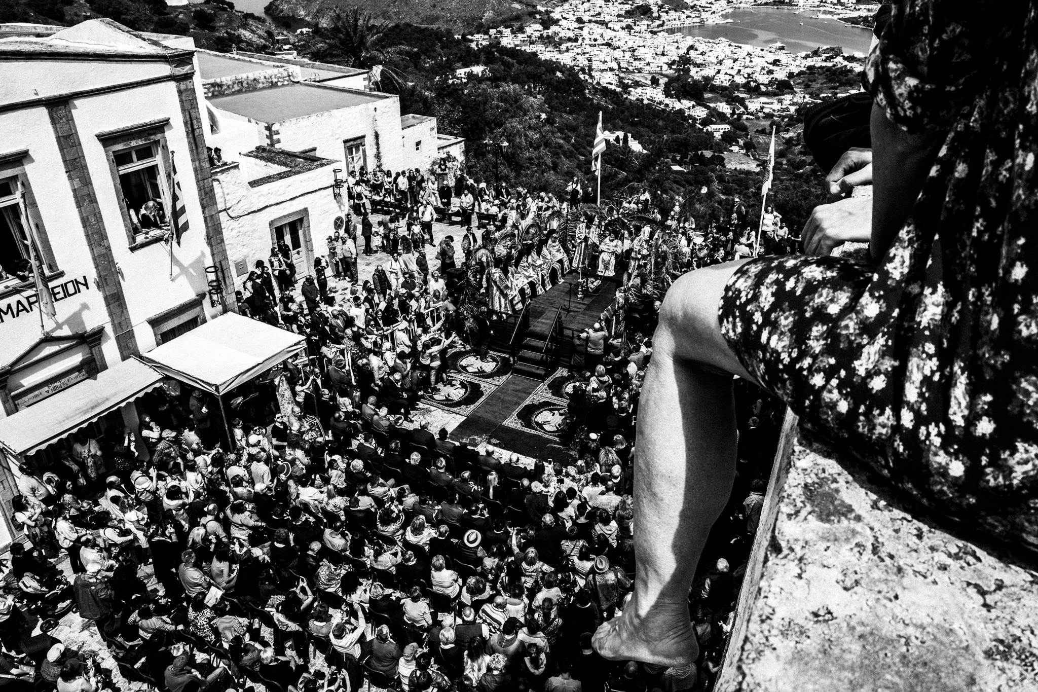 A big crowd at the custom of Niptiras on Holy Thursday, Patmos island, by photographer George Tatakis
