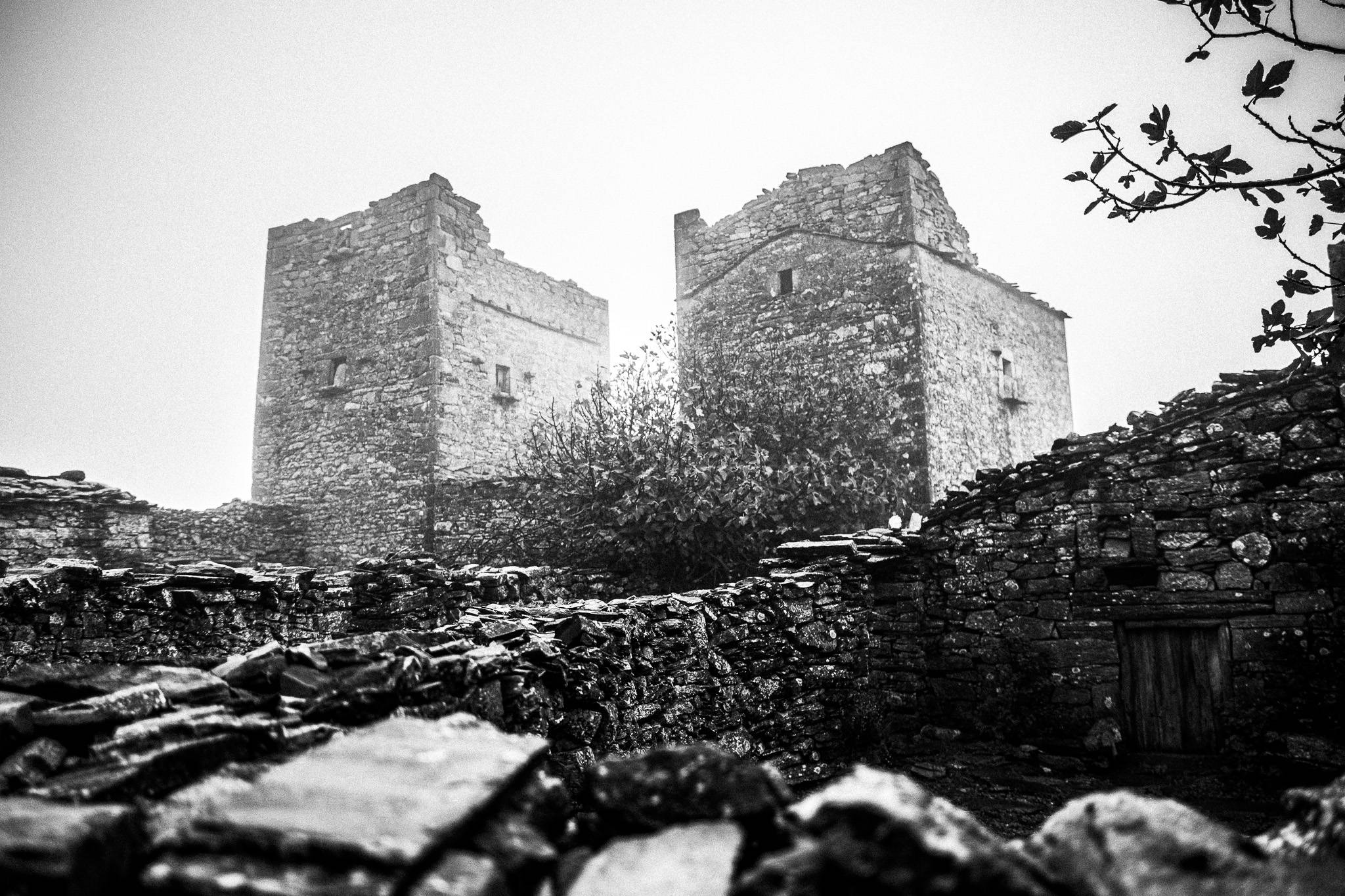 Towers at Mountanistika, Mani in the Peloponnese. Black and white photography by George Tatakis during the filming of 'Φόνισσα'(Fonissa).
