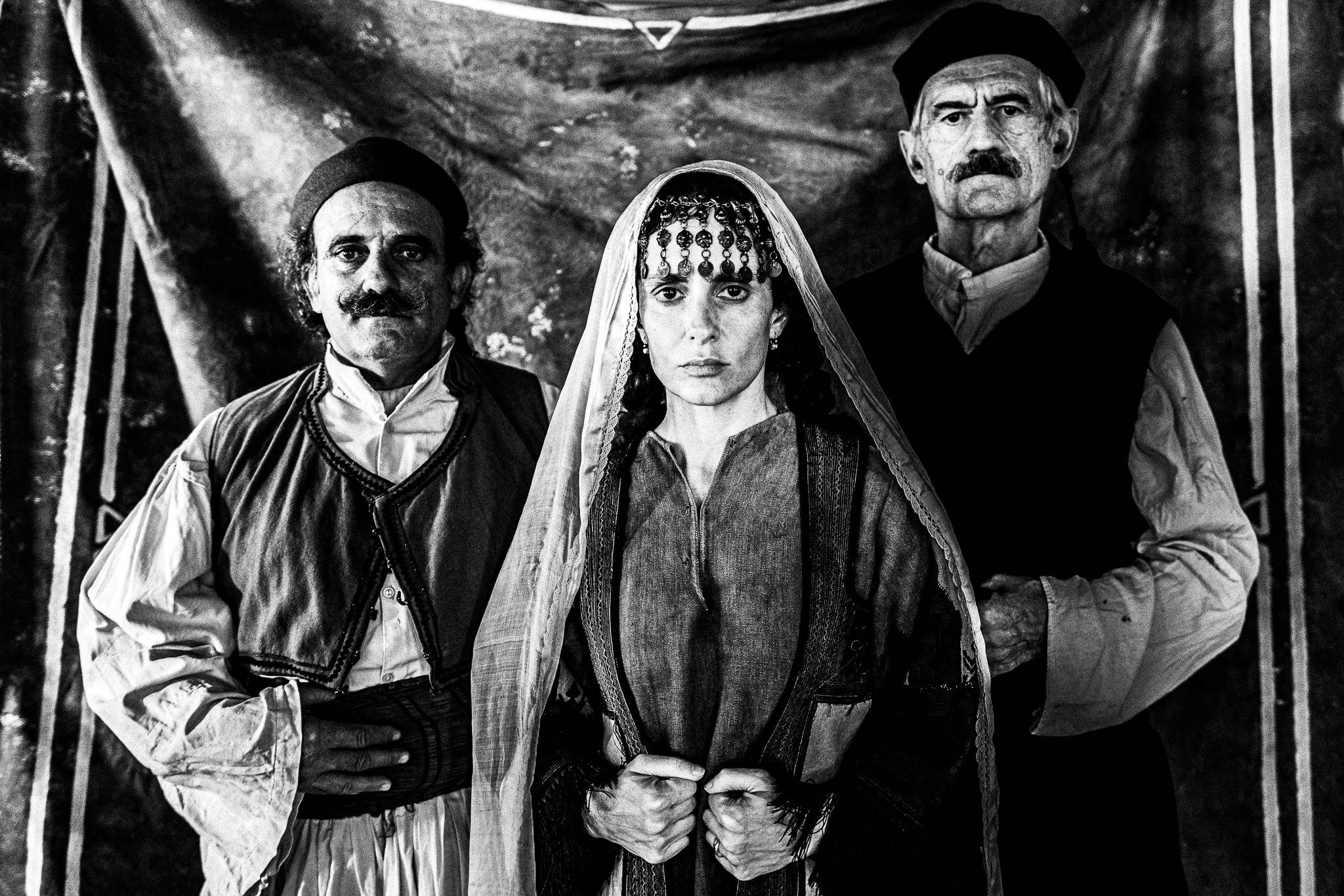 Portrait of a family. Black and white photography by George Tatakis during the filming of 'Φόνισσα'(Fonissa).