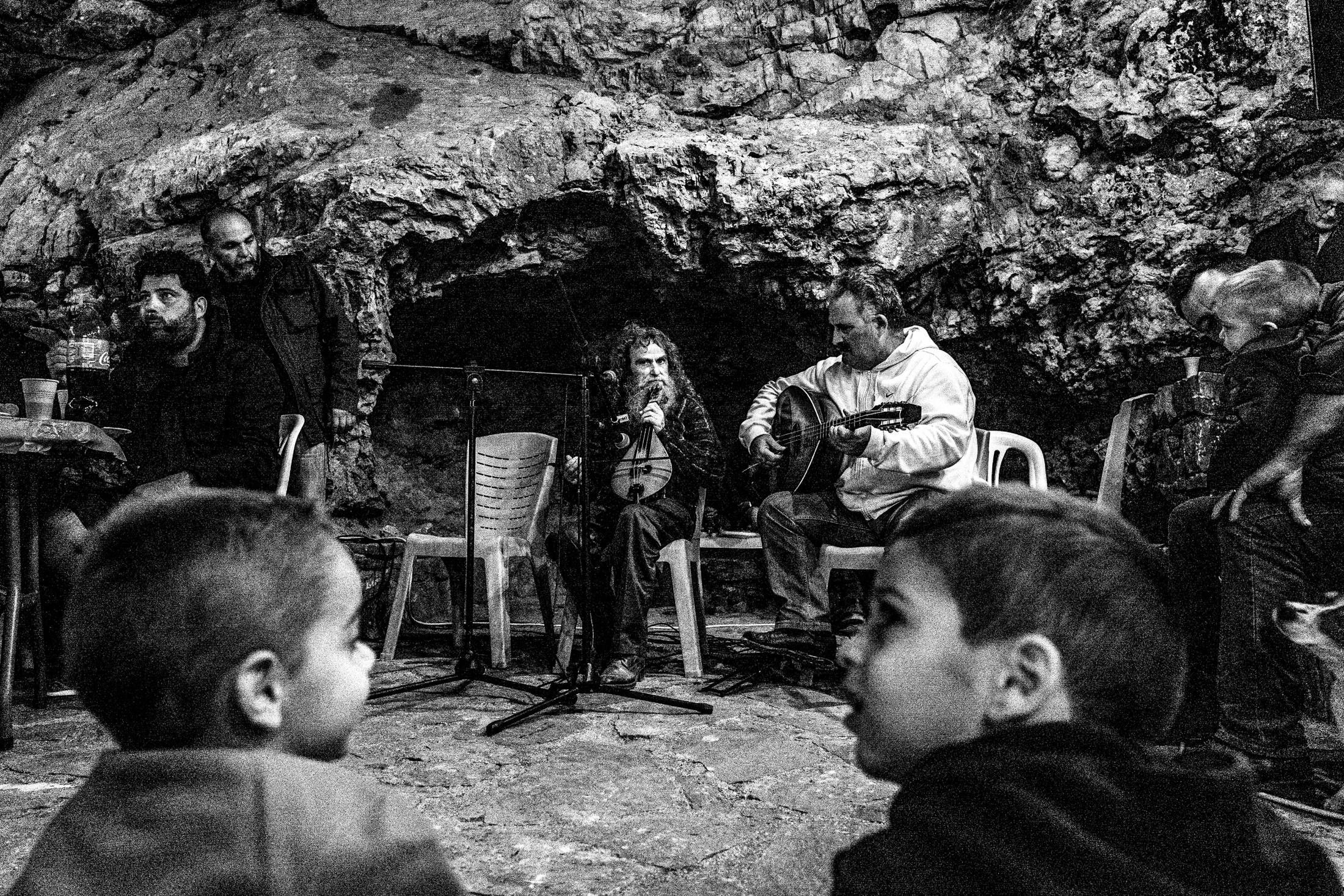 Music and singing around St Fanouris' church at Psiloritis, Anogia, Rethymnon, Crete, by photographer George Tatakis