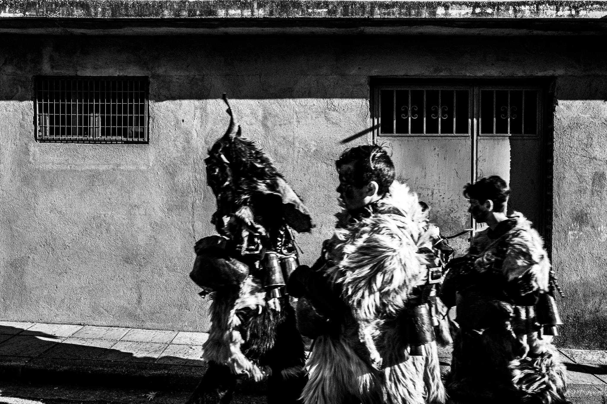 Arapides in the streets, Pagan Christmas customs of Northern Greece, by photographer George Tatakis