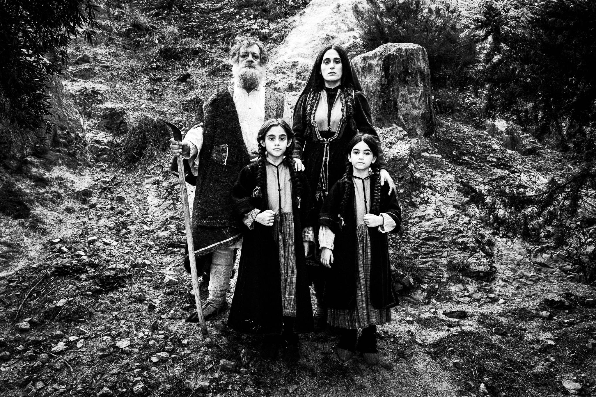 Portrait of a family. Black and white photography by George Tatakis during the filming of 'Φόνισσα'(Fonissa).