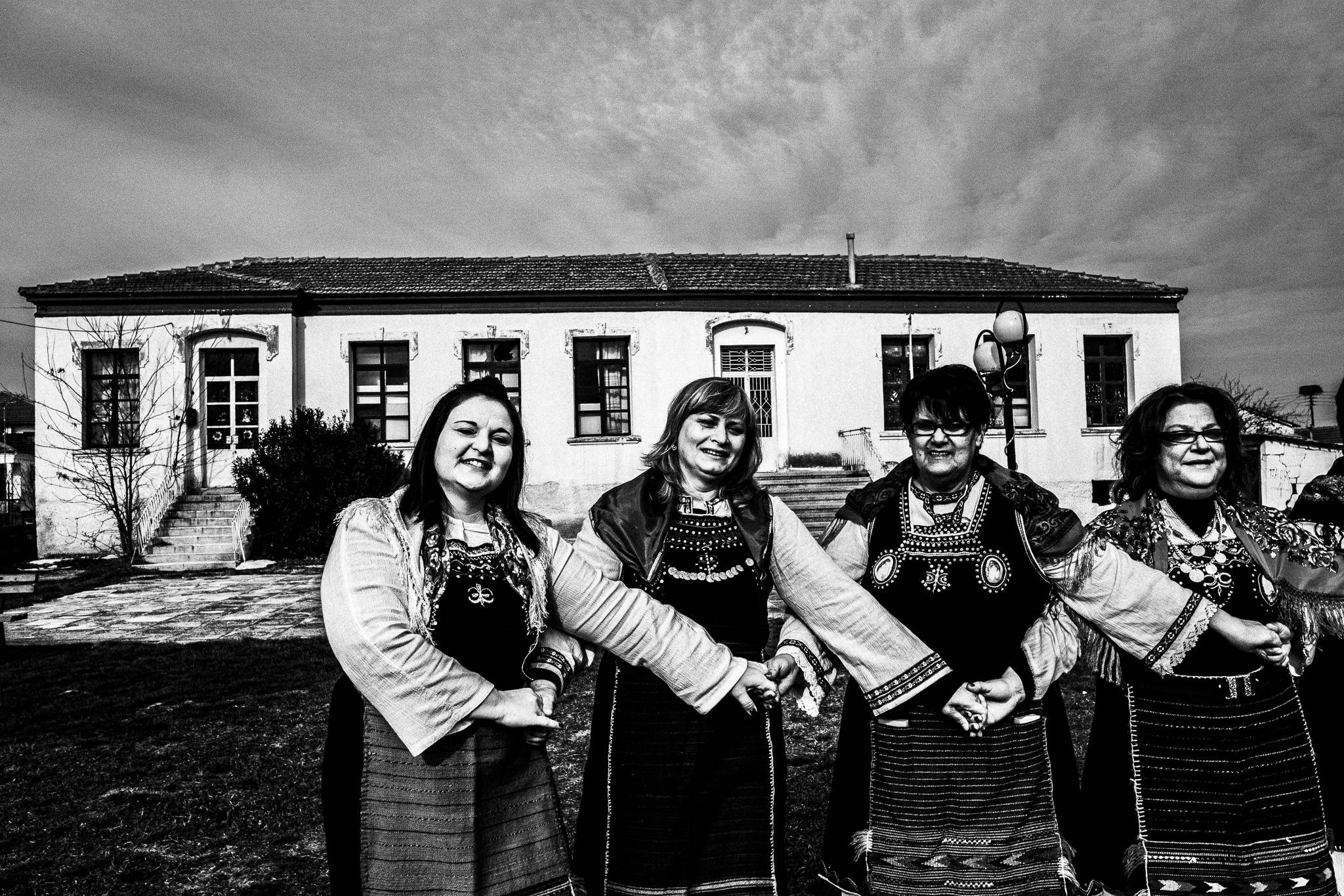 Dancing at a courtyard, Pagan Christmas customs of Northern Greece, by photographer George Tatakis