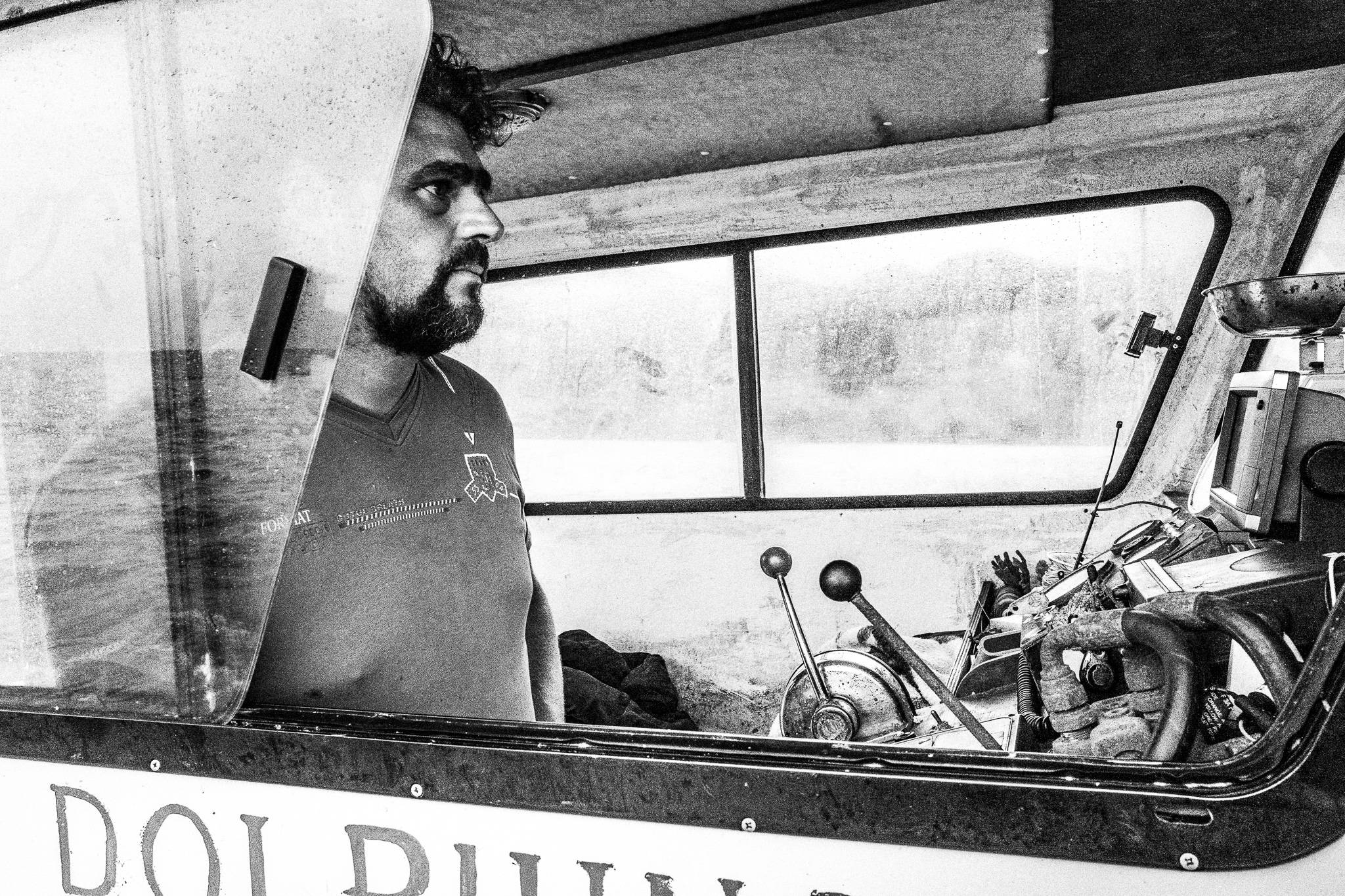Captain Pavlos fishing. Diafani, Olympos, Karpathos, Greece. Black and white photography by George Tatakis