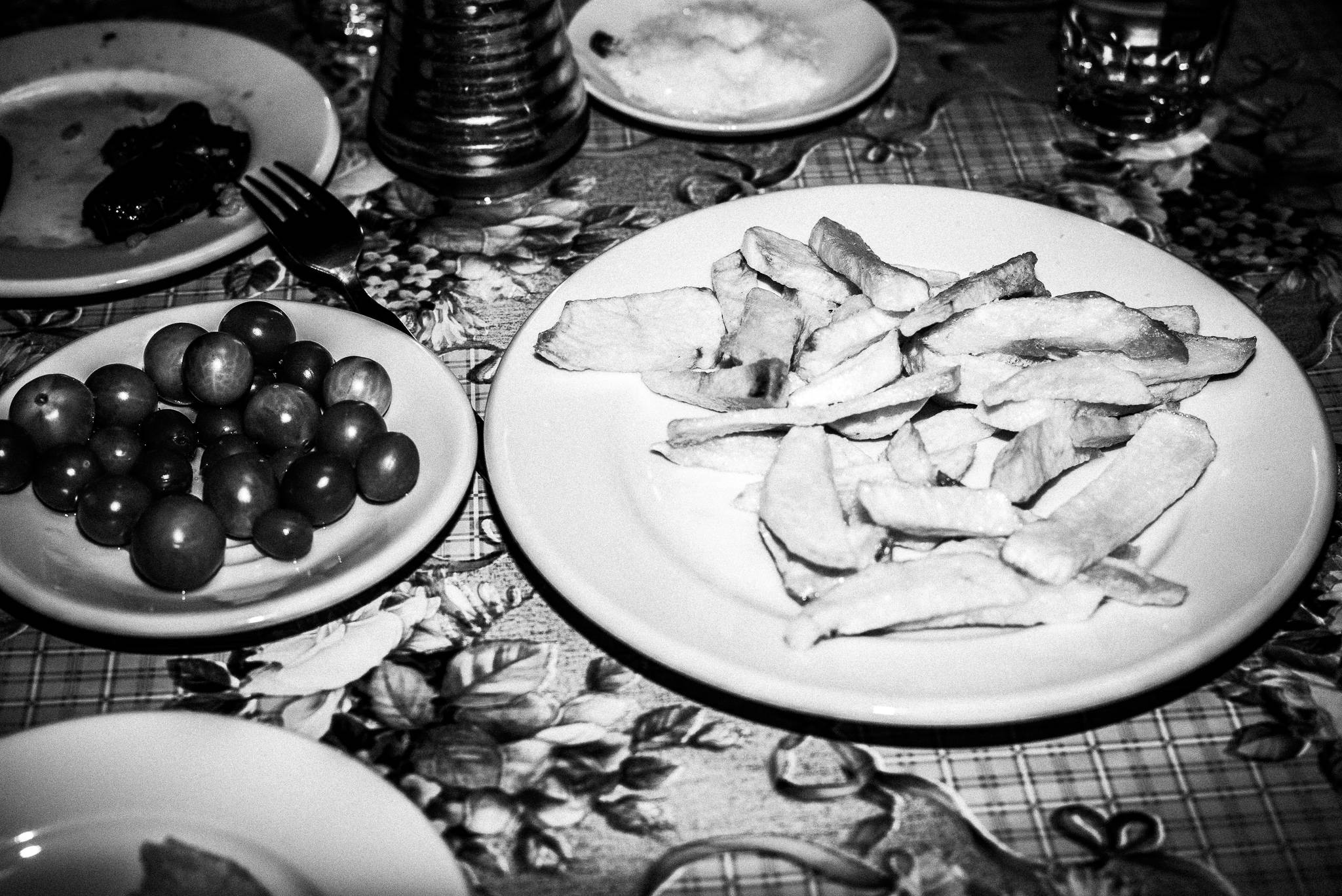 Food at café Crete in Olympos, Karpathos, Greece. Black and white photography by George Tatakis 