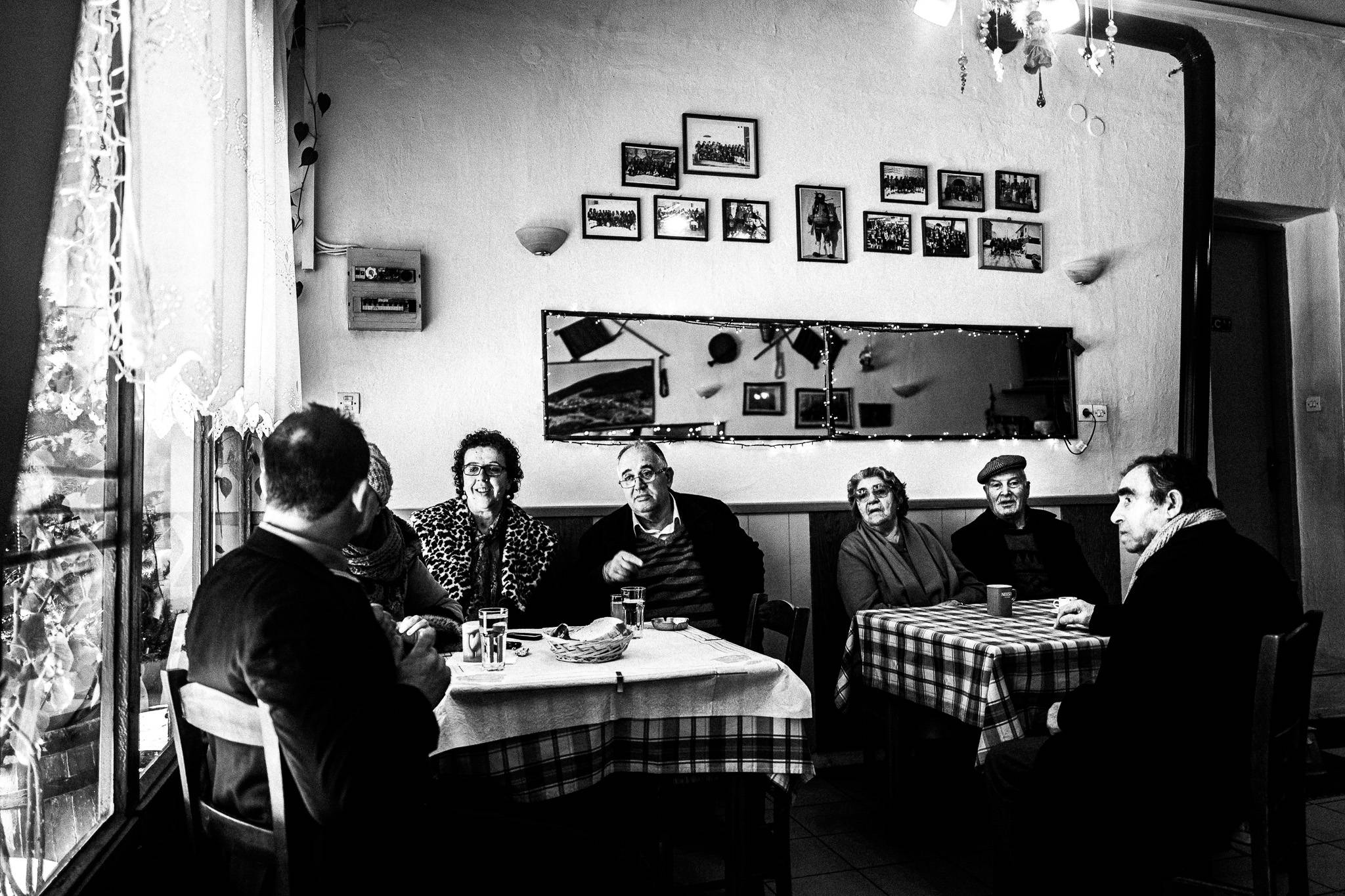 At the local café, Pagan Christmas customs of Northern Greece, by photographer George Tatakis